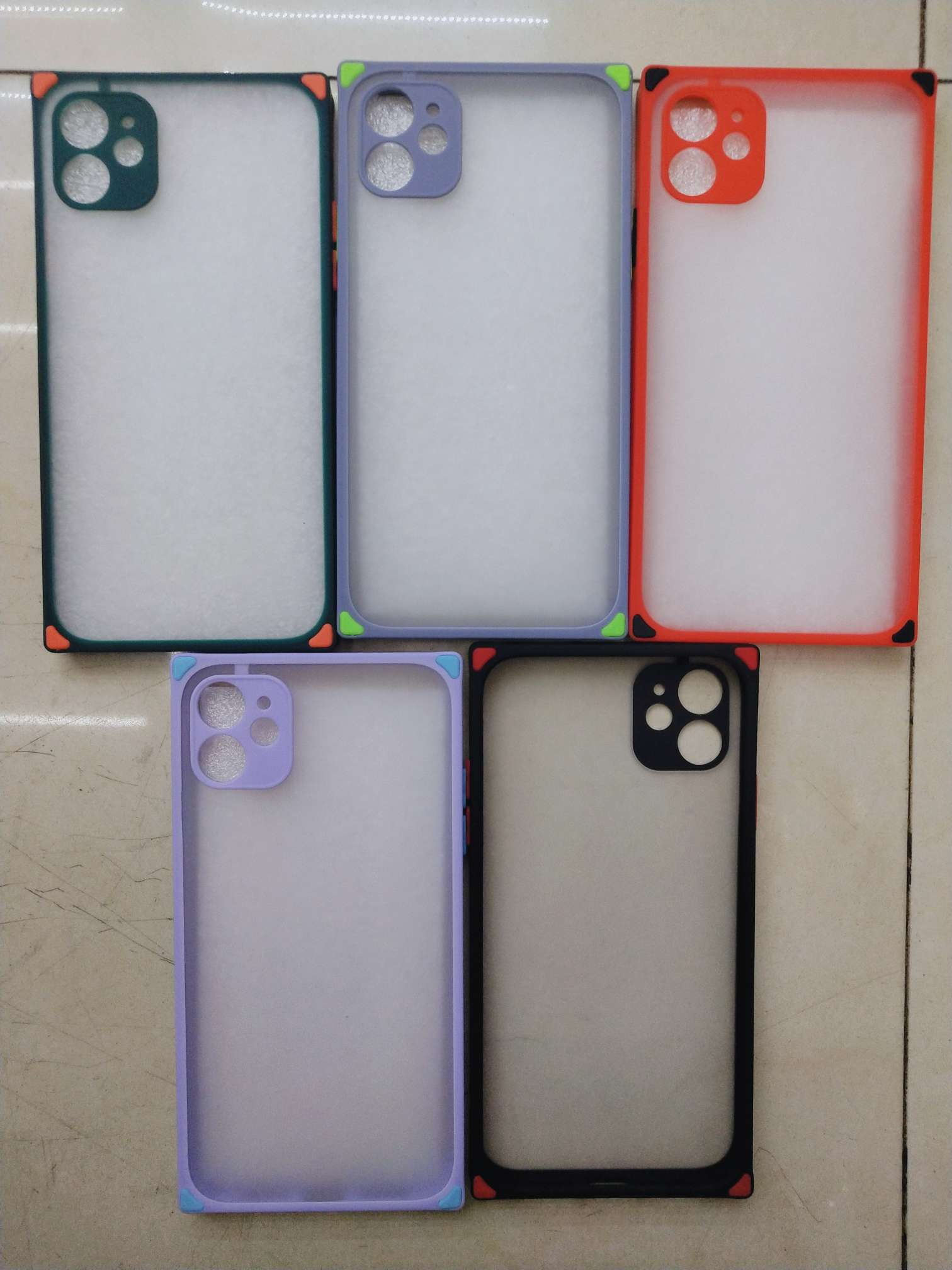Square skin color contrast button phone case