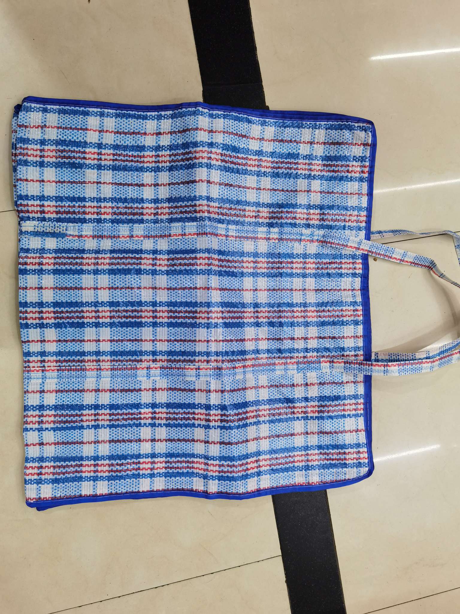 Double-sided tape for woven bags