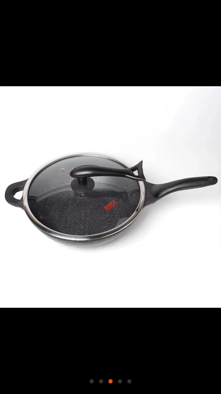 A 32cm die-cast marble wok