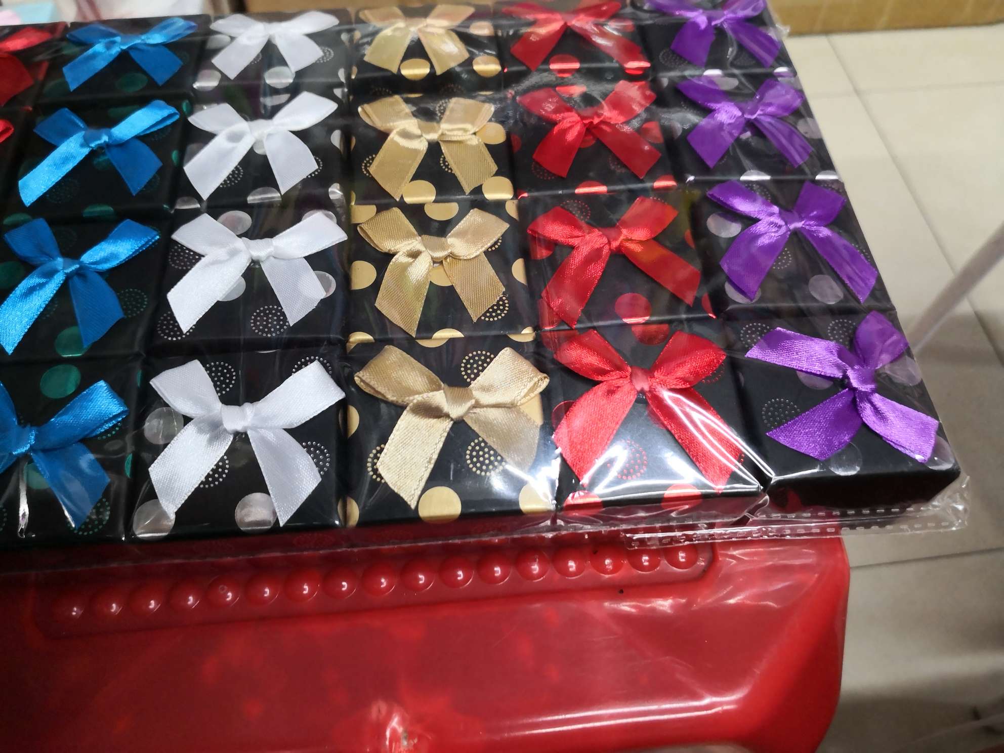 Black film with gold foil ring box