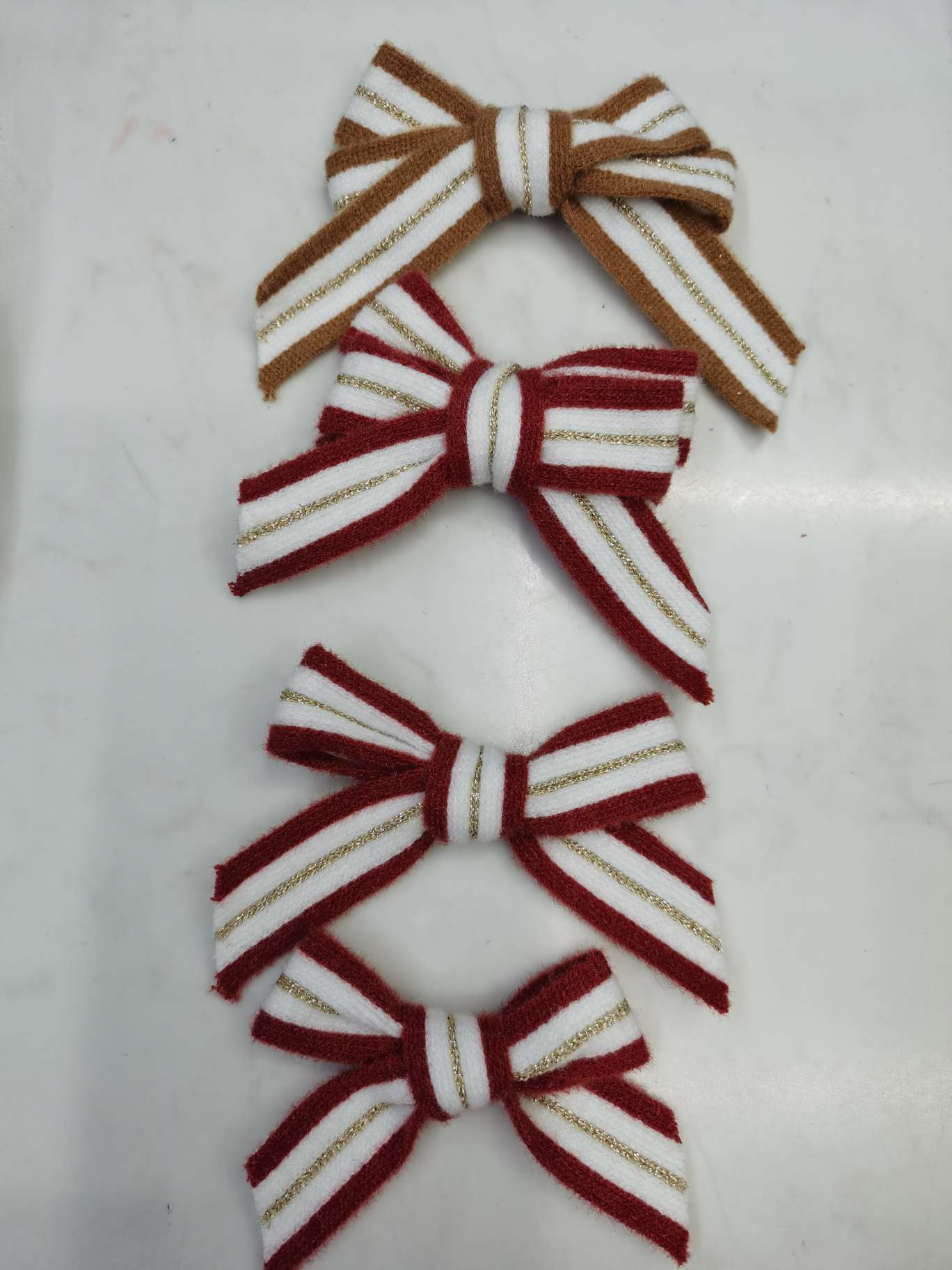 A mink woven ribbon bow undefined