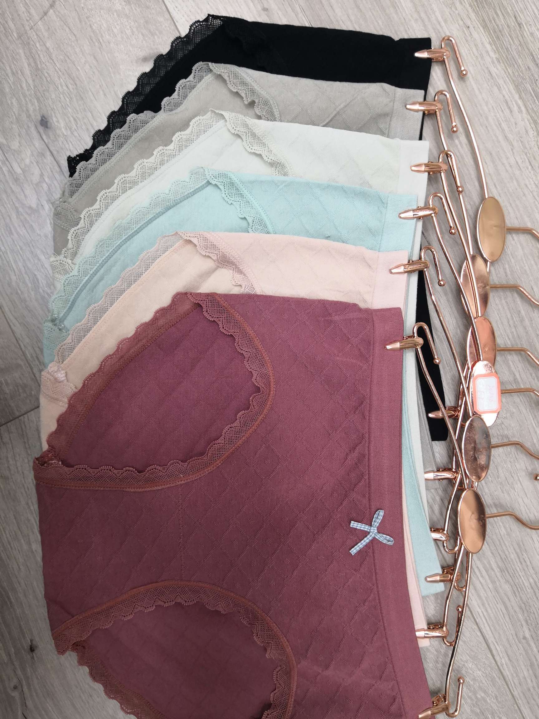 Premium comfort-focused underwear for men and women in neutral and mood-enhancing tones