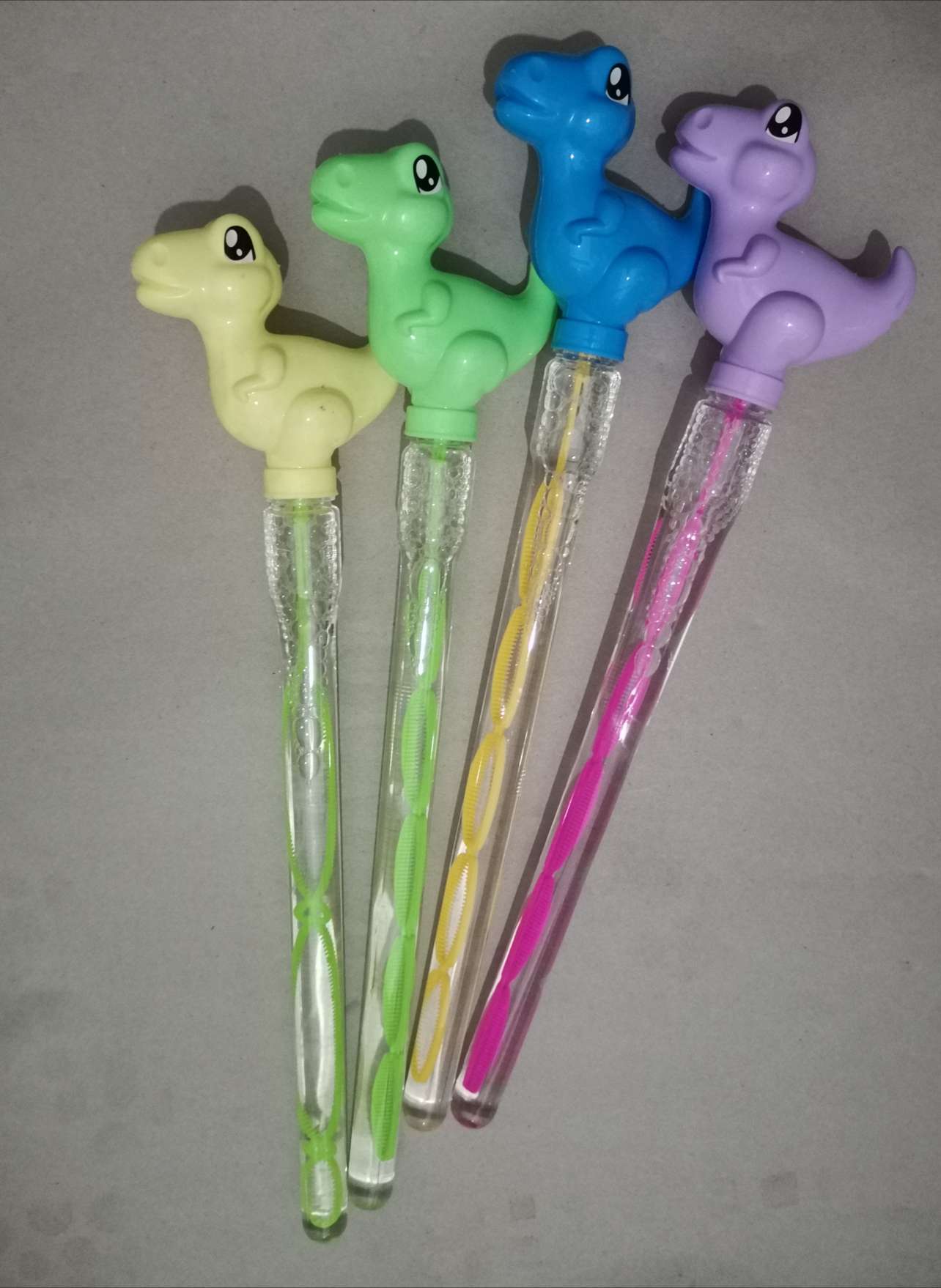 Glowing dinosaur bubble stick thumbnail