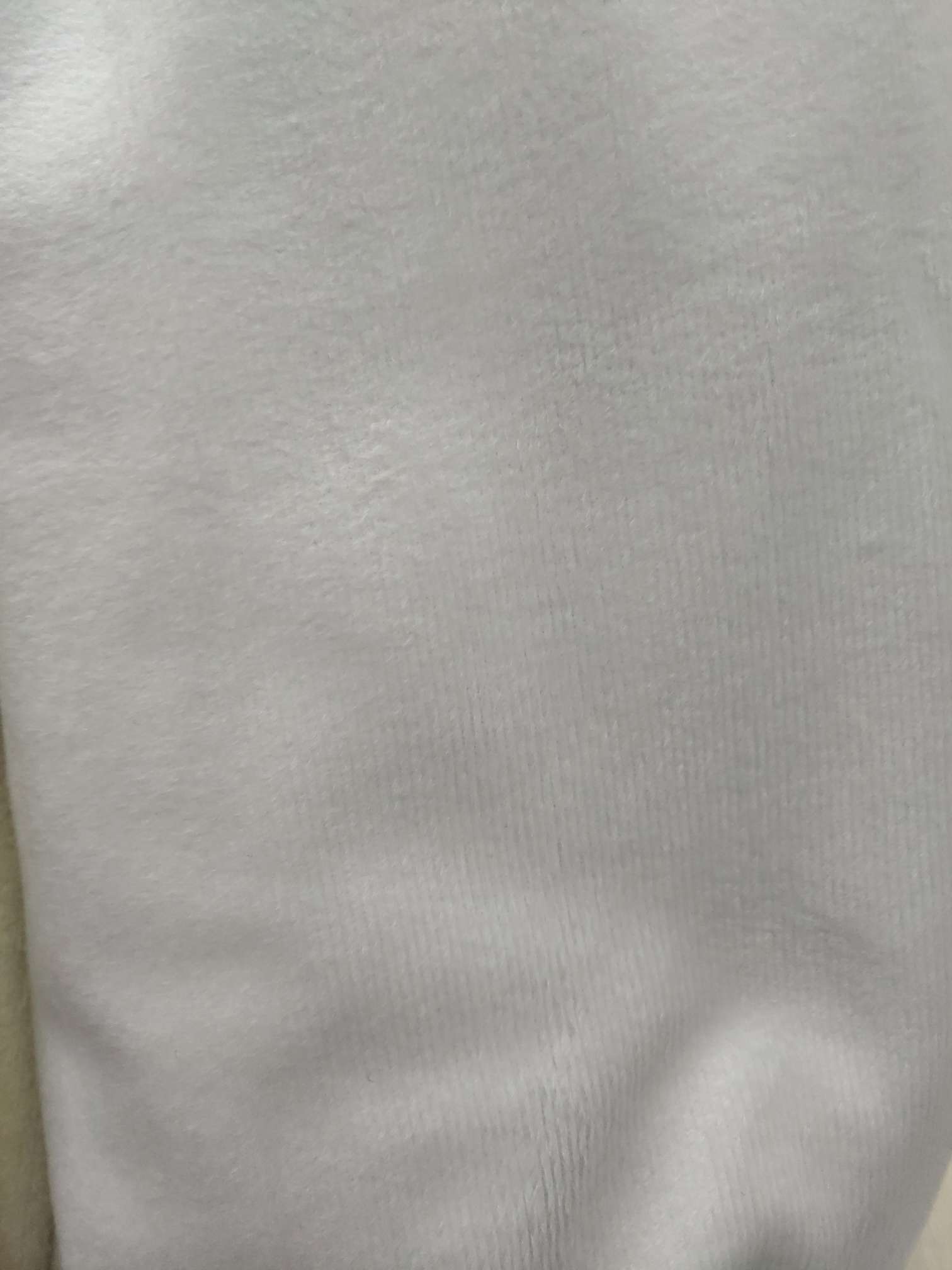 Pure white velvet carpet fabric