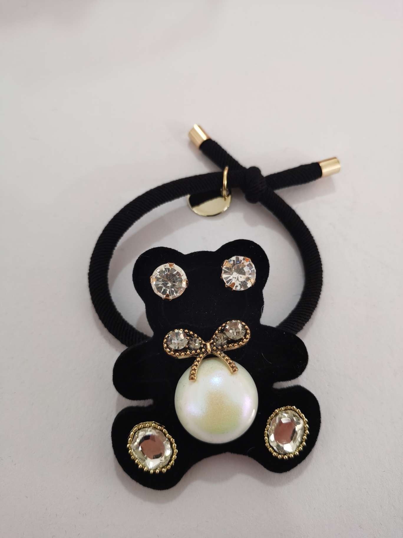 New black fabric bear side clip and top clip from Dongdaemun, South Korea, featuring a fashionable duckbill clip and a unique rubber band for girls