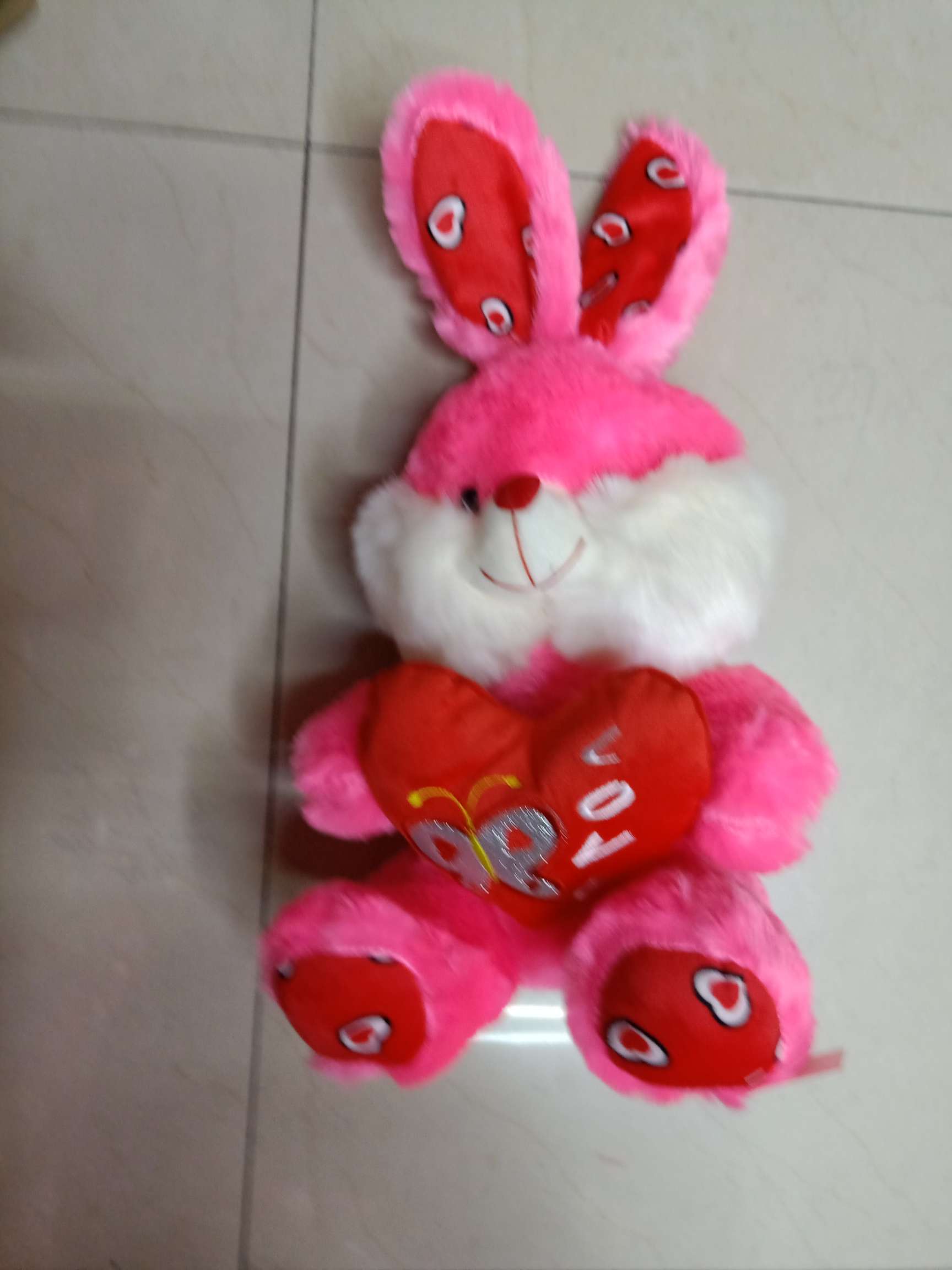 Rabbits with arms and heart thumbnail
