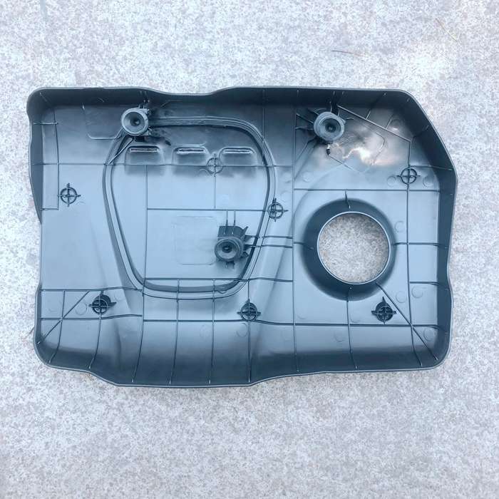 The hood cover on the engine guard