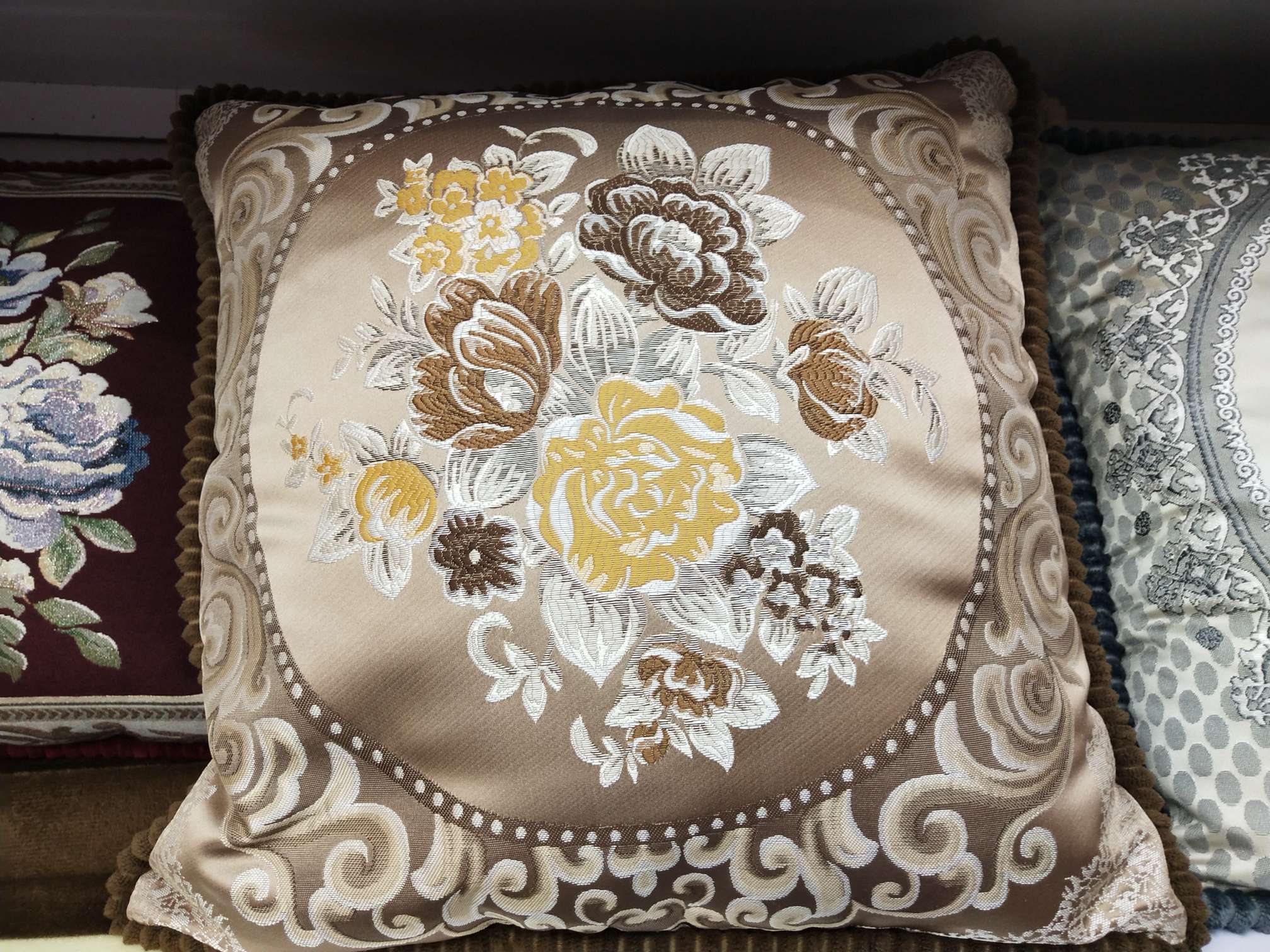 embroidered throw pillow