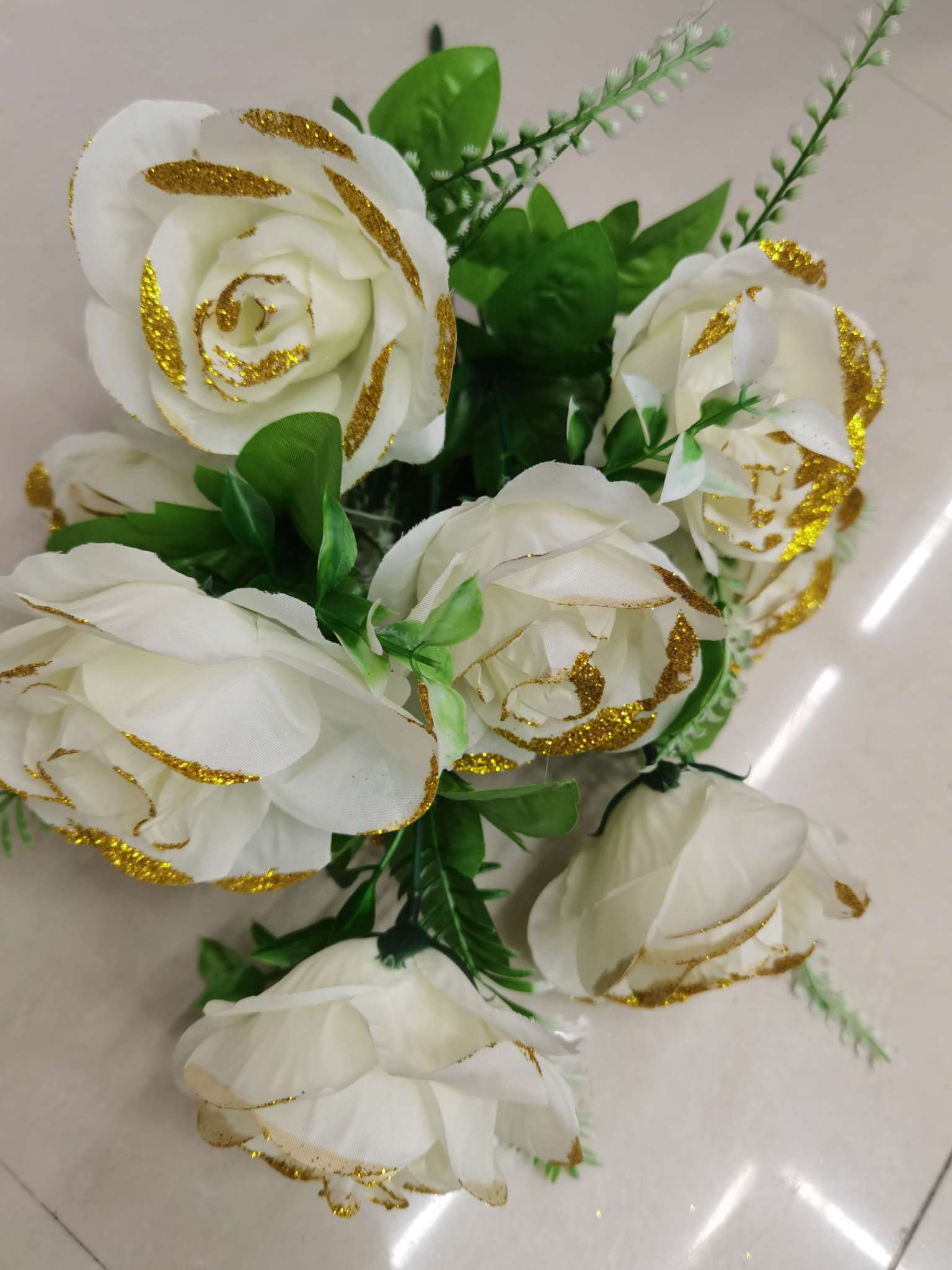 Nine golden-pink roses undefined