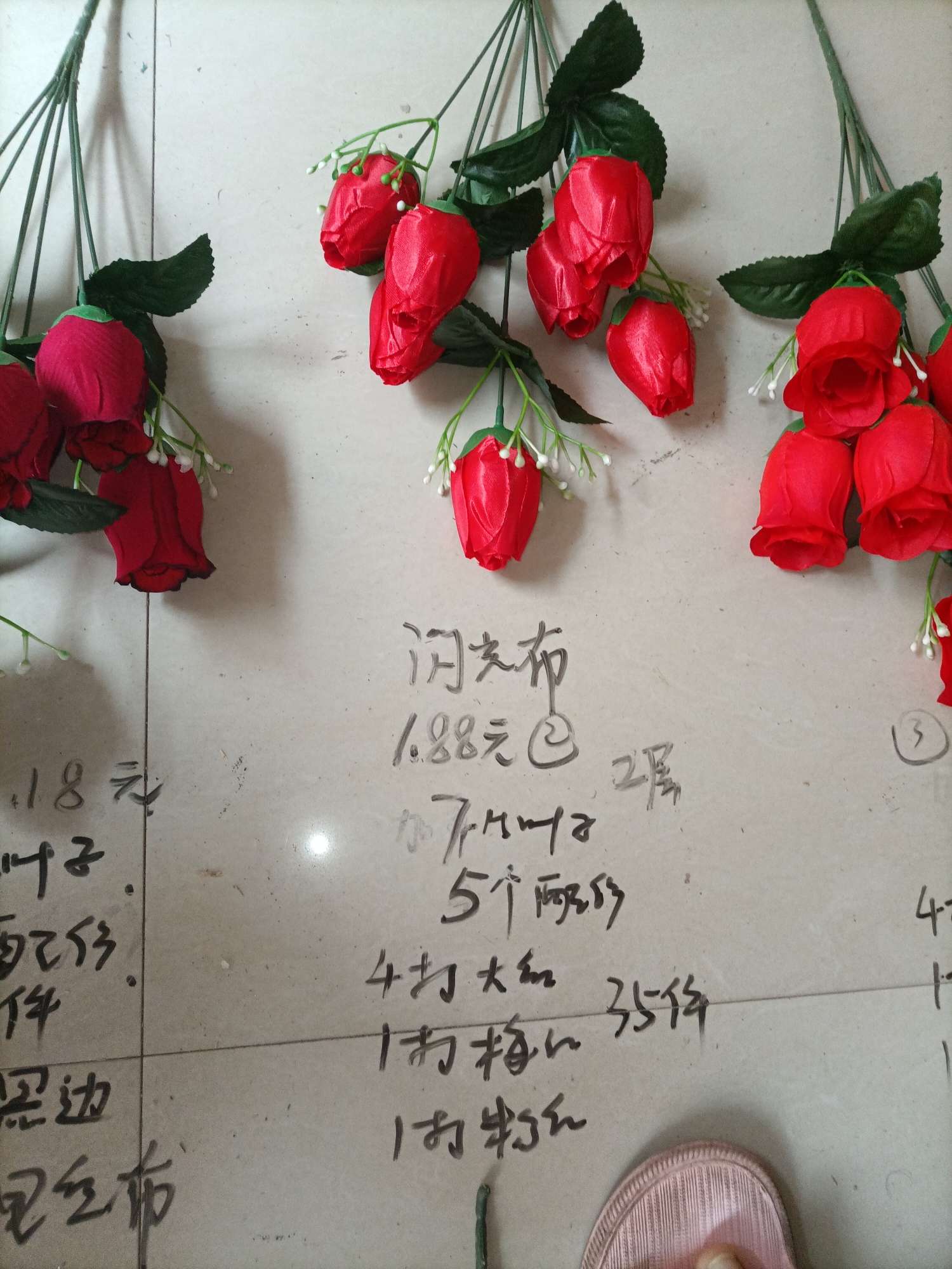 Seven shiny cloth roses