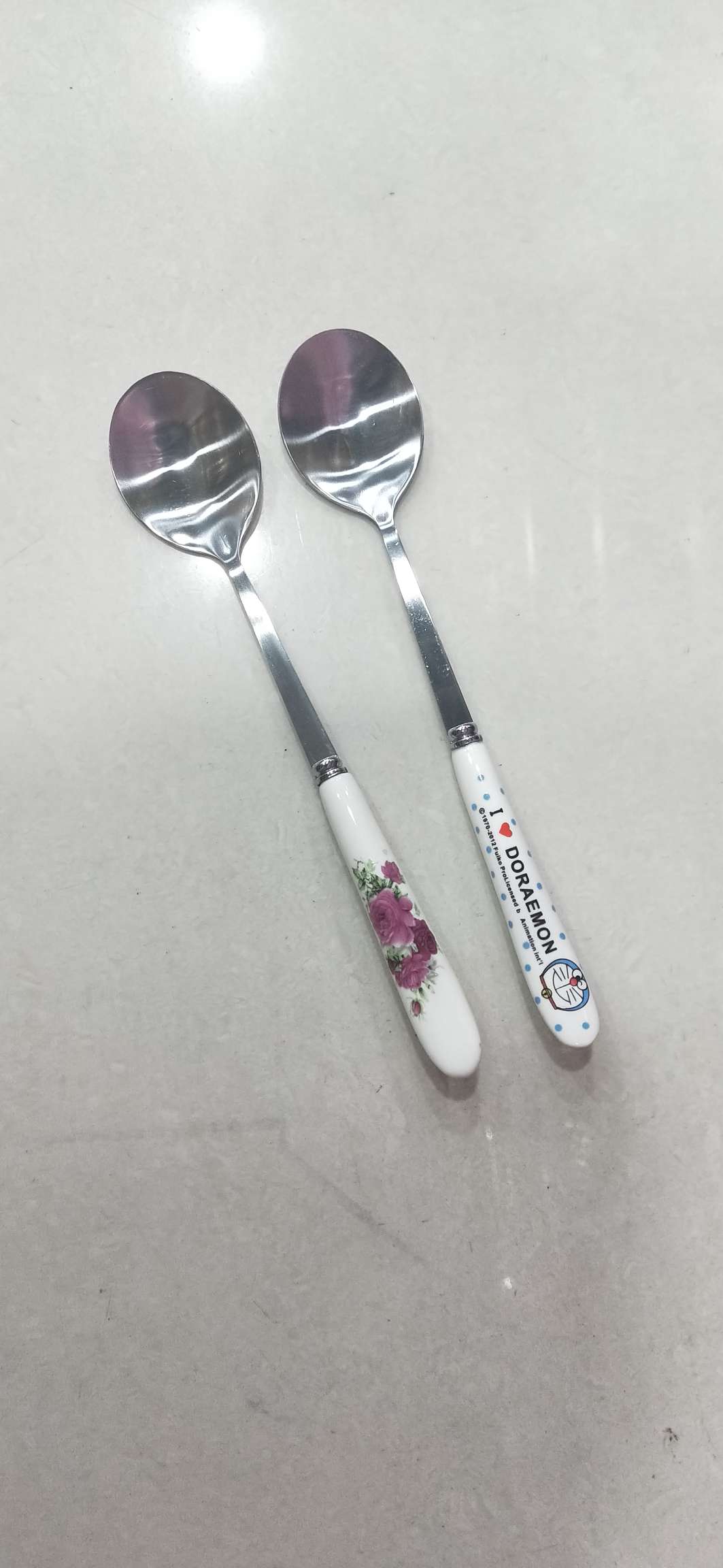 Spoon with ceramic handle