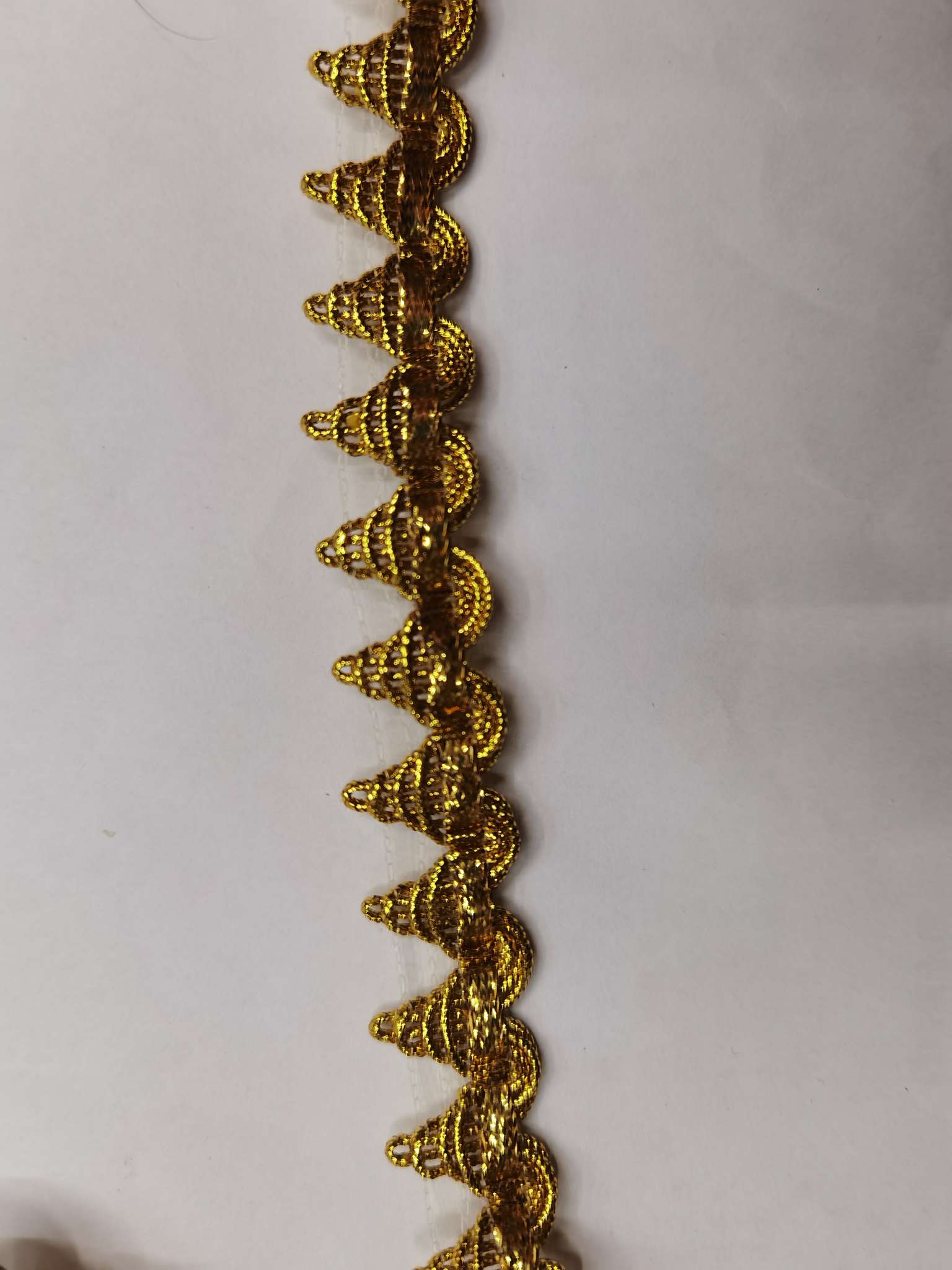 The small pyramid has multicolored lace