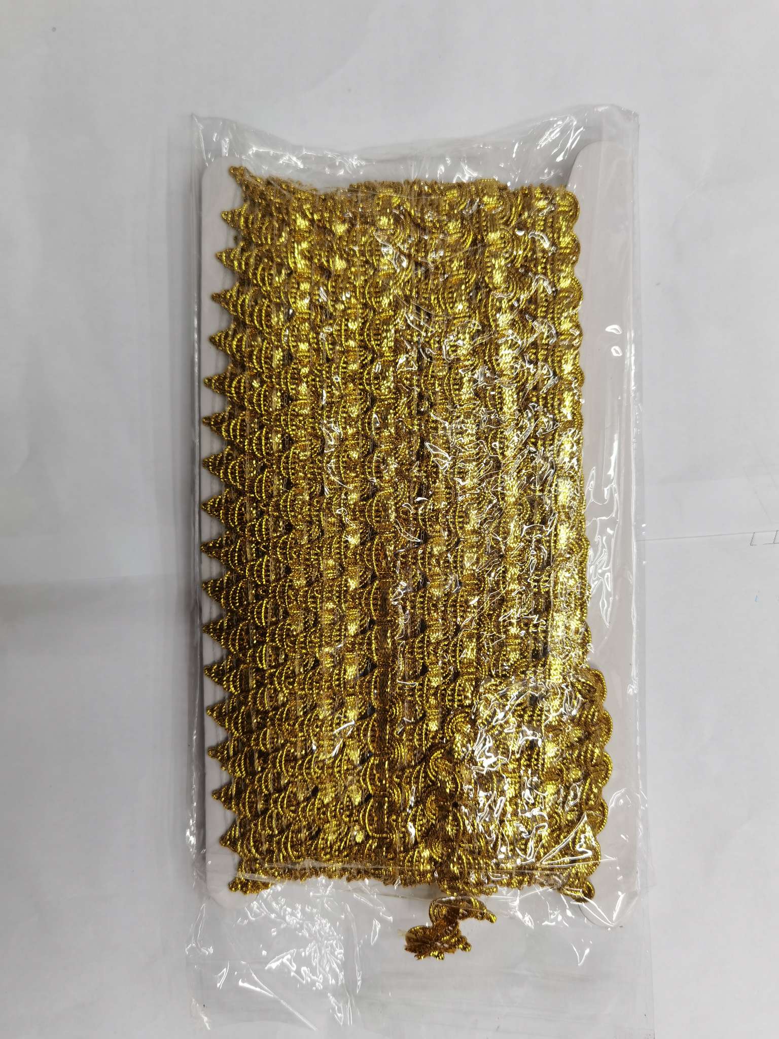 The small pyramid has multicolored lace details Picture