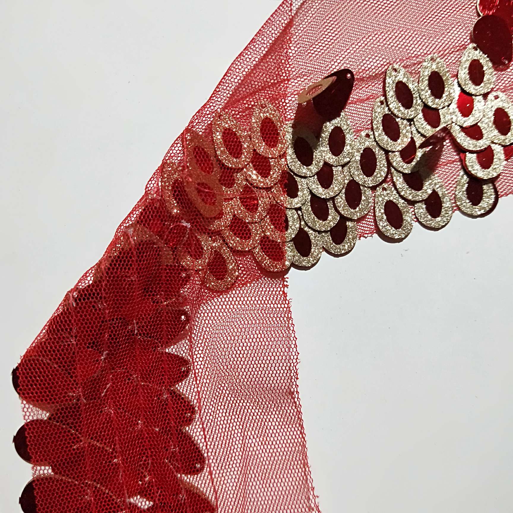 孔雀亮片网布厂家直销现货供应民族风格白底实物图