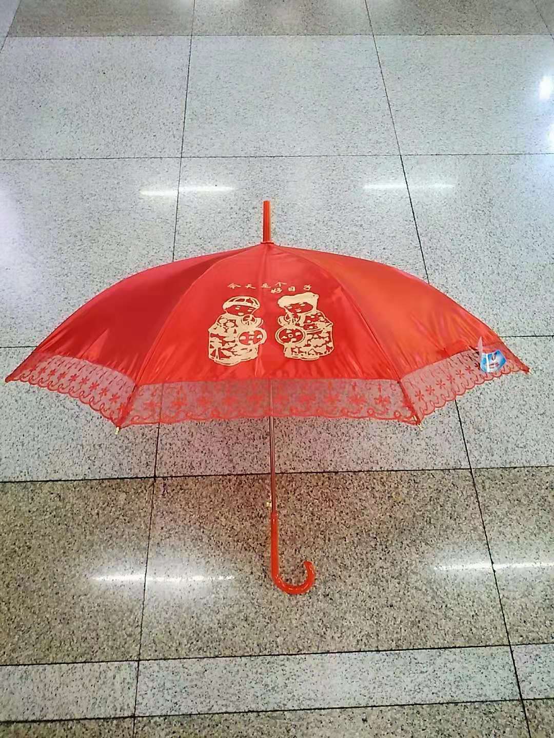 "National Trend 101 Red Umbrella for Brides with Red Umbrellas by the Lace Side.