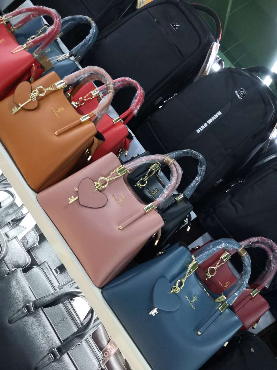 香港啄木鸟品牌女包 牛皮纹 手提单肩斜挎女包 经典爆款详情图6