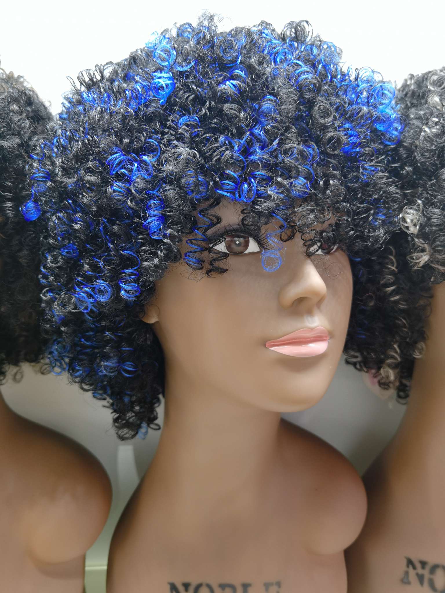 Blue and black short hair with curly hair