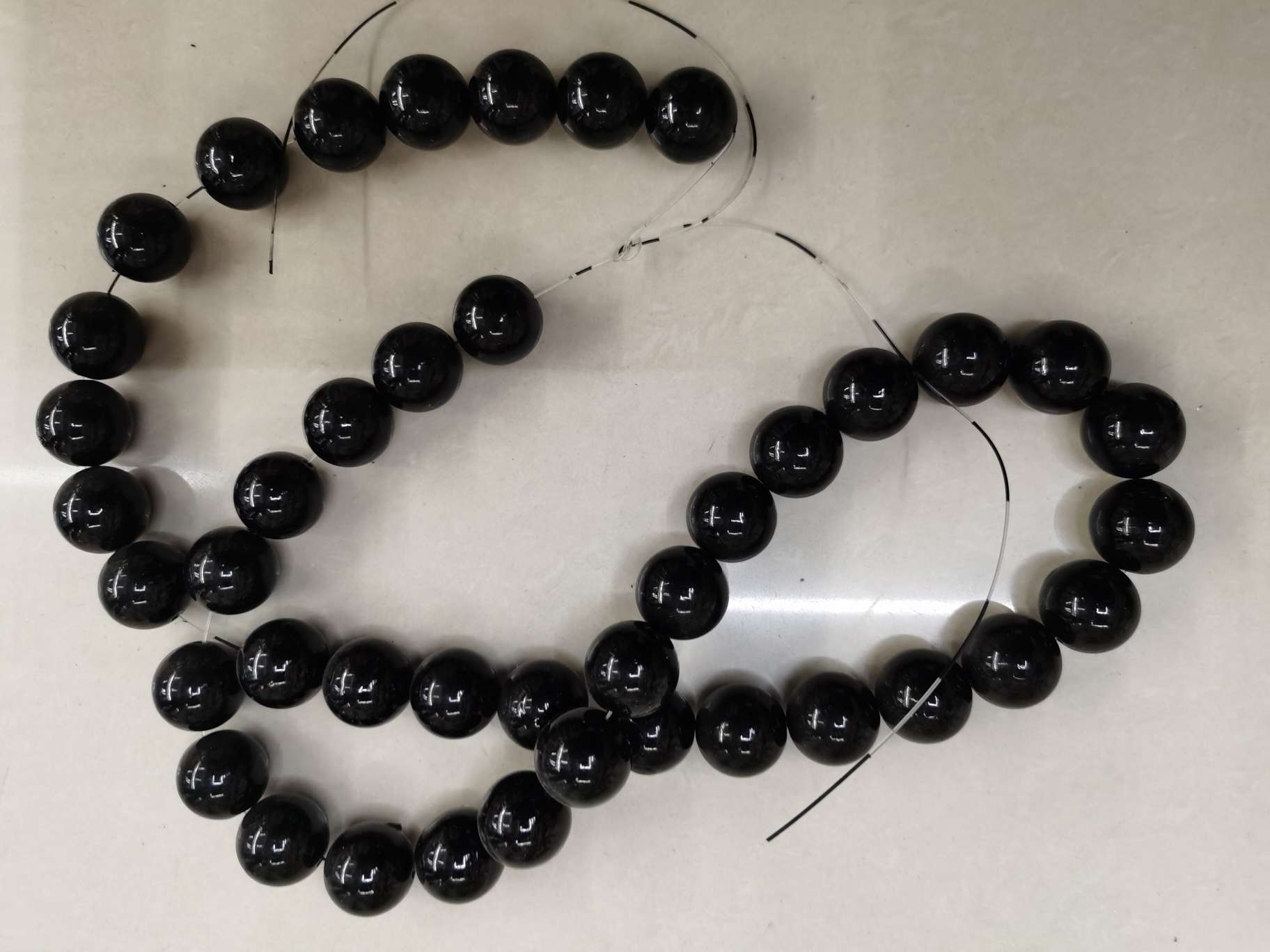 25# Perforated black pearl