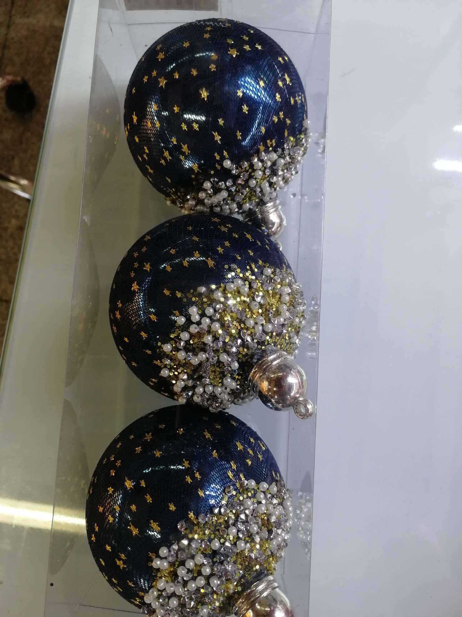 Hojas de perlas azules