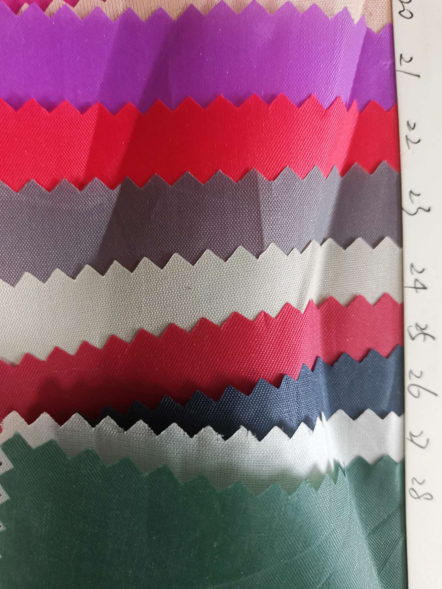 厂家直销大量现货批发里布7号色箱包购物袋化妆包装饰里布面料产品图