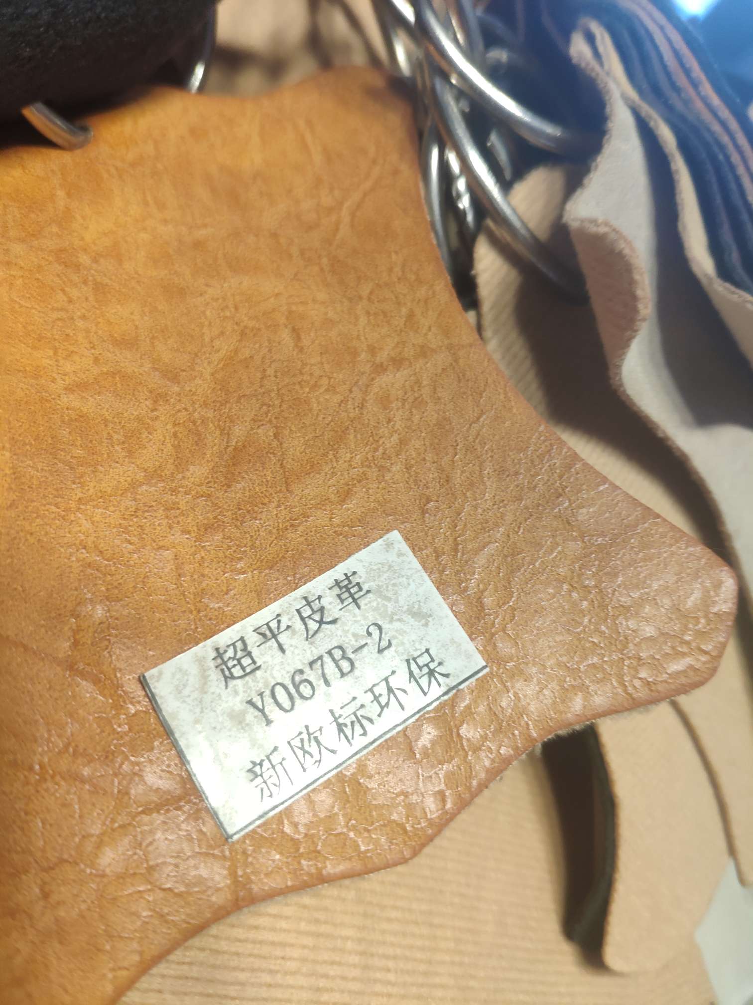 Y067B-3 factory direct sales, hot-selling new PU leather, large stock, high, medium and low grade luggage, sofa, shoe materials, fabric, leather fabric Application Scenario