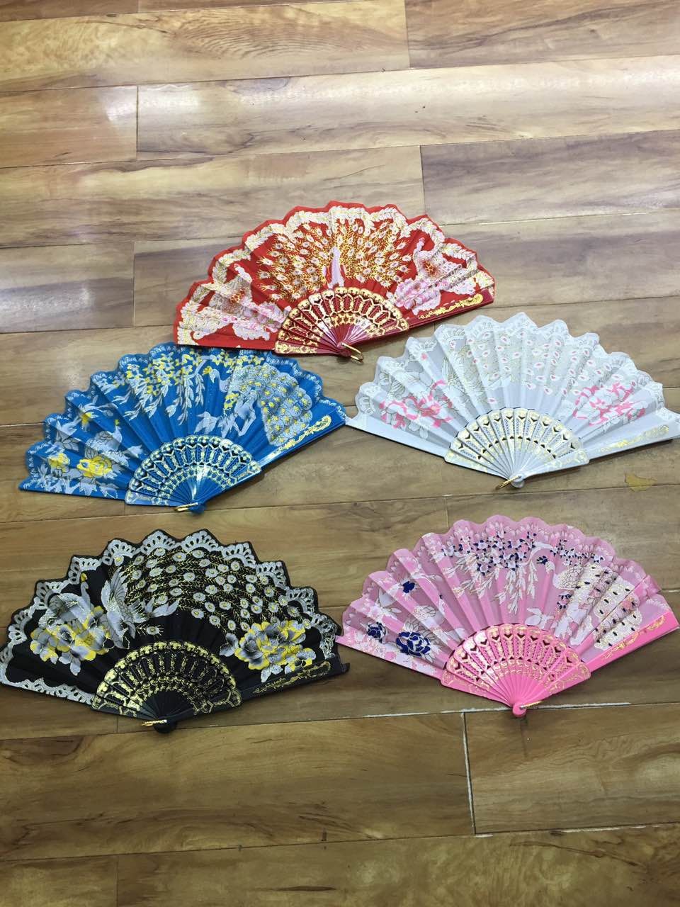 塑料烫金孔雀扇子产品图