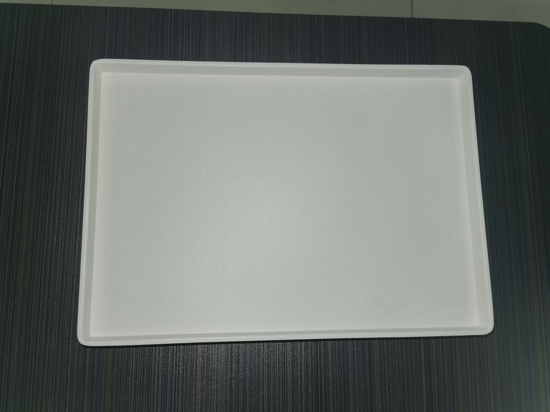 Four Color Lightweight Small Tray on a modern desk with accessories