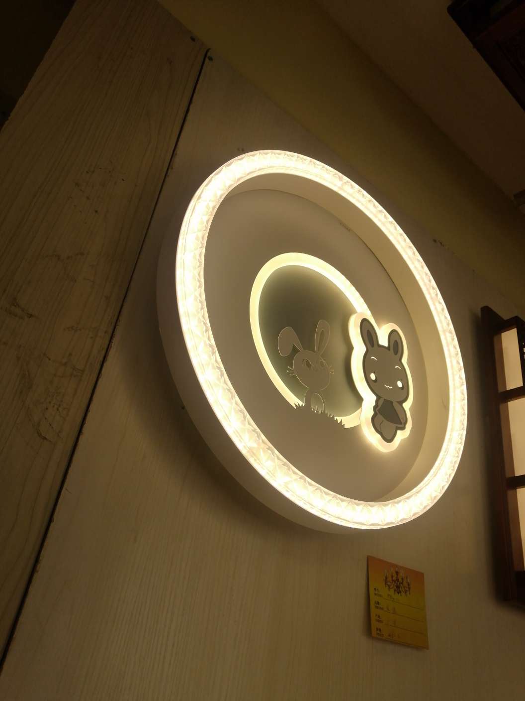 The living room lamp is modern, simple, elegant, creative and light luxury. The bedroom lamp is a little rabbit details Picture