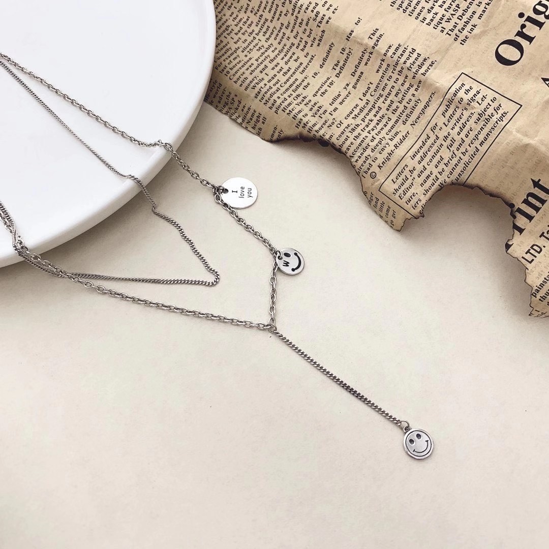 UKI SILVER and Ji S925 sterling silver smiley Face necklace details Picture