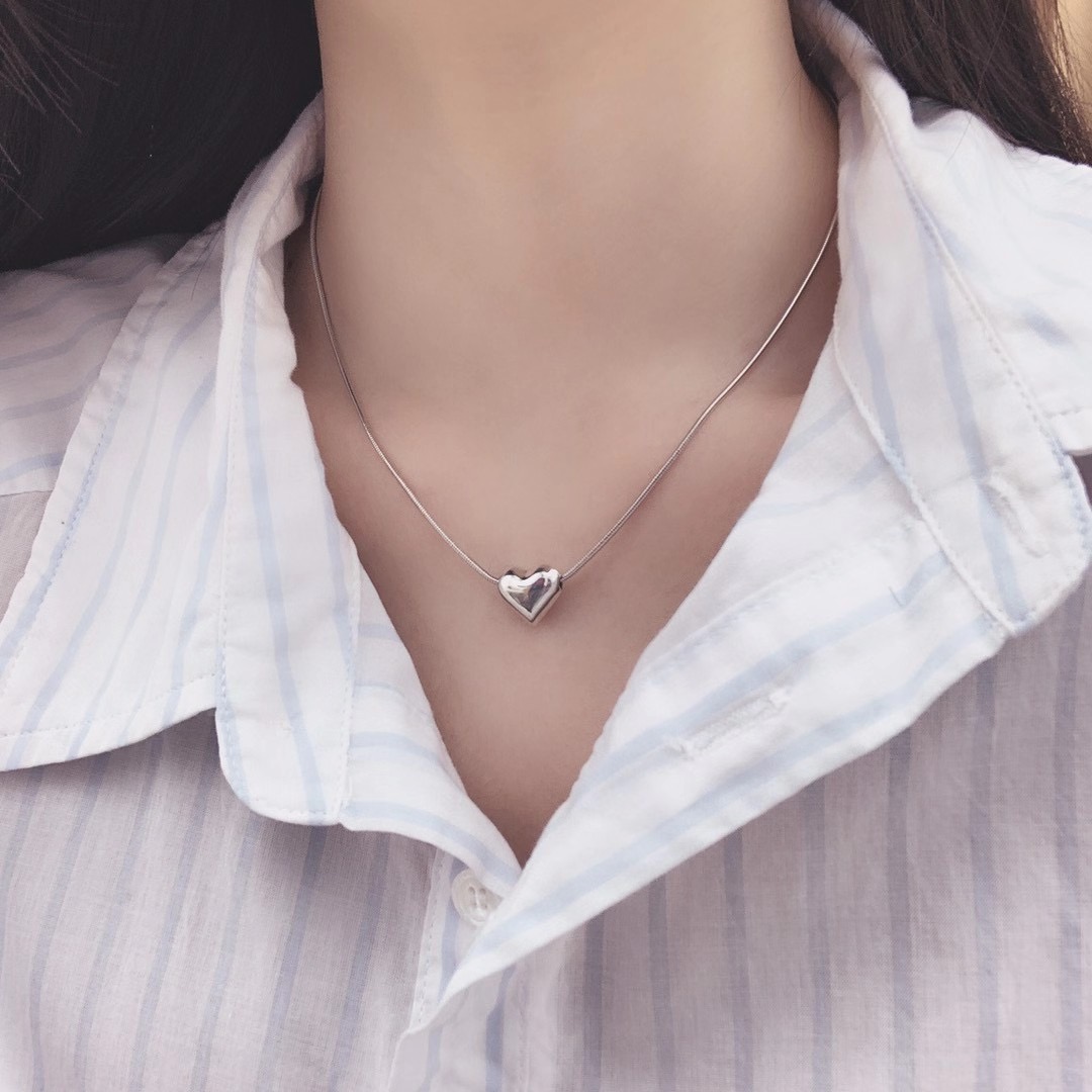 UKI SILVER and Ji S925 sterling silver heart-shaped snake bone necklace