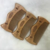 Factory direct sales of natural wood peach wood combs, horn-shaped combs, small hair care combs, portable combs 12-1 details Picture