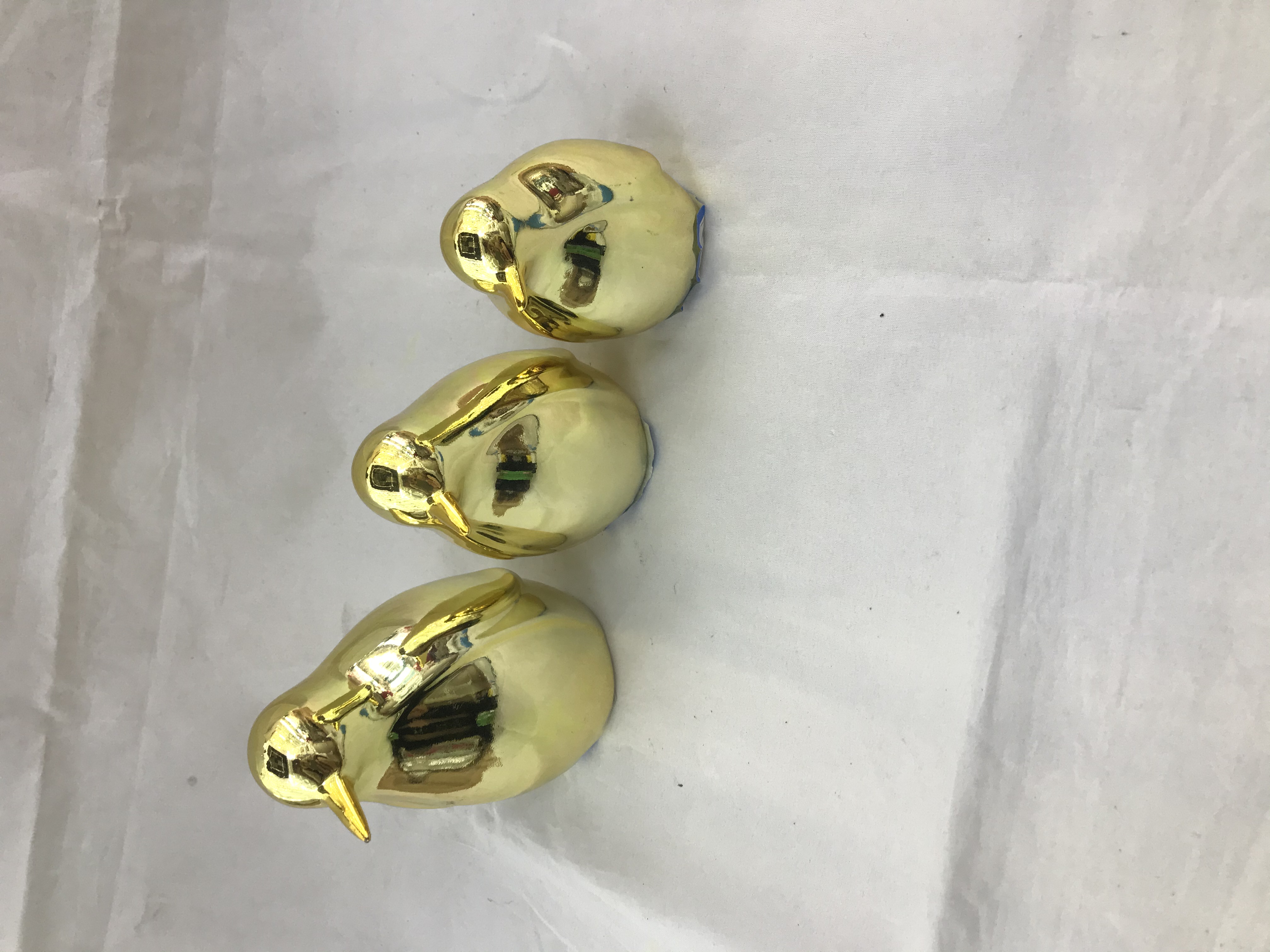 Ceramic electroplated penguin figurine detail image 1