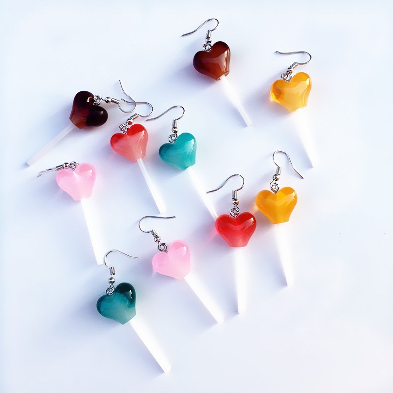 Japonés lindo viento amor lollipop pendientes puede hacer clips de oído