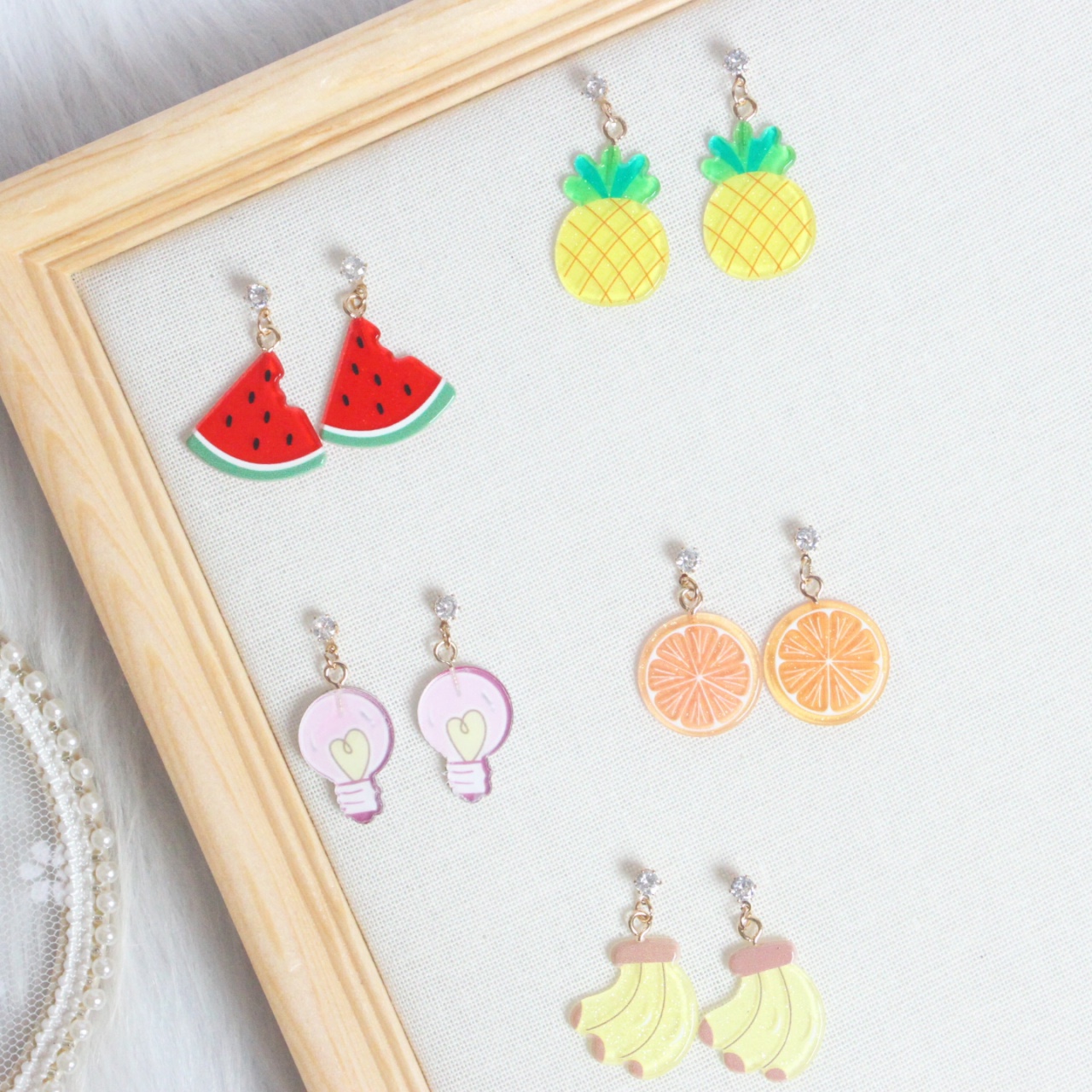 The Japanese and Korean Harajuku Spring and Summer simulated fruit resin earrings can be used as ear clips