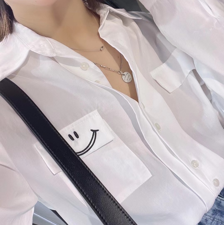 The shirt is white