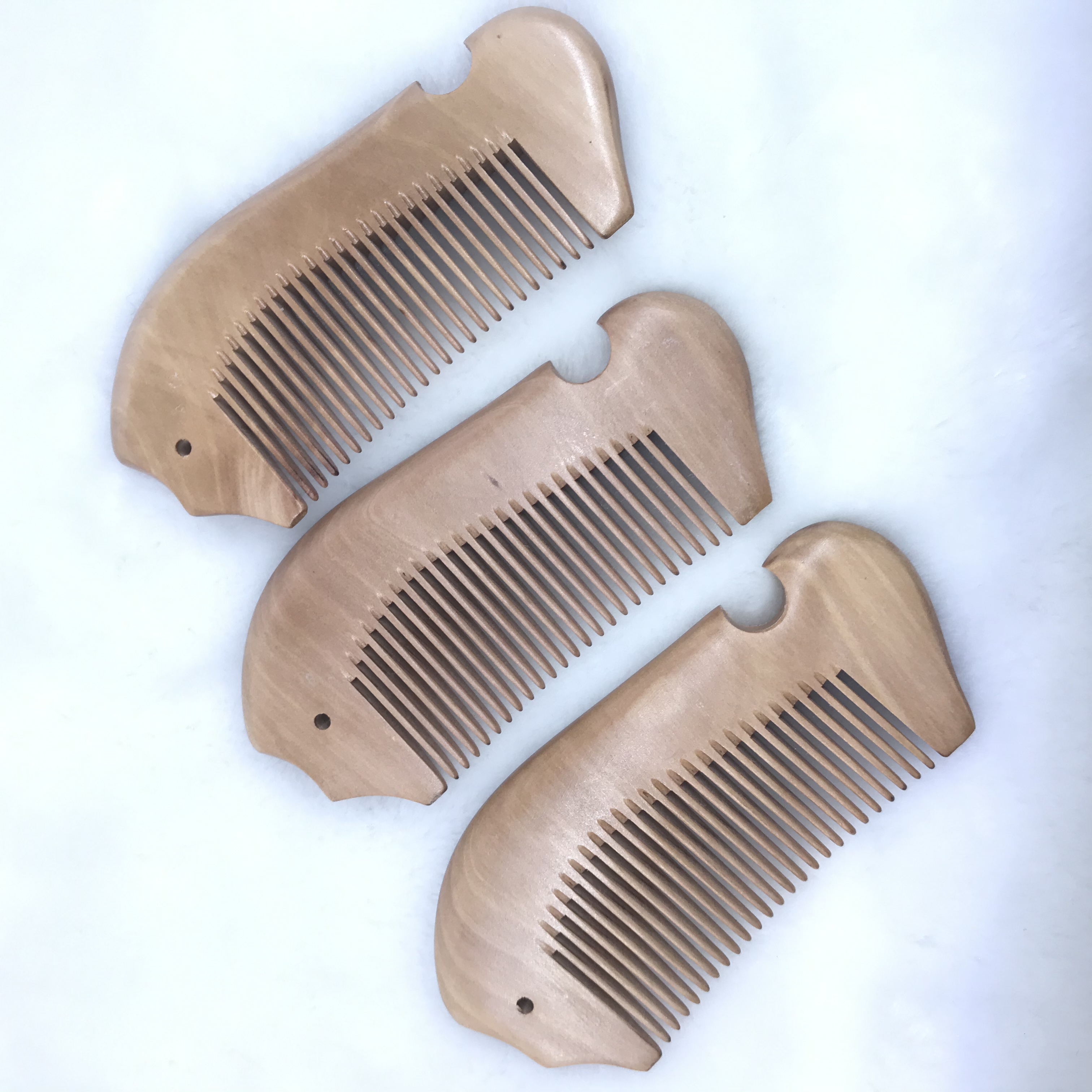 Factory direct sales of genuine natural wood nanmu fish-shaped combs, small hair combs, anti-static hair straightening combs detail image 2