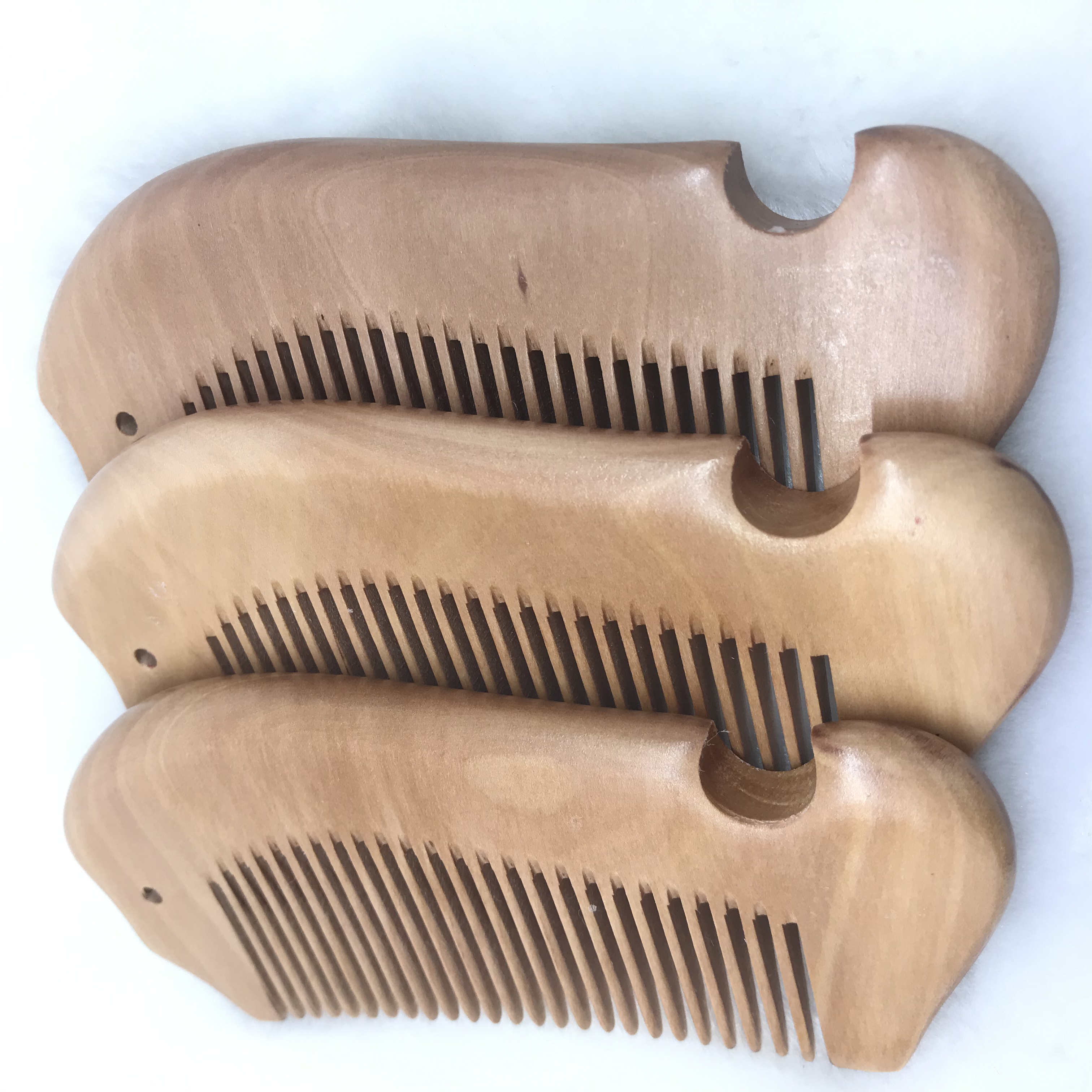 Factory direct sales of genuine natural wood nanmu fish-shaped combs, small hair combs, anti-static hair straightening combs detail image 7
