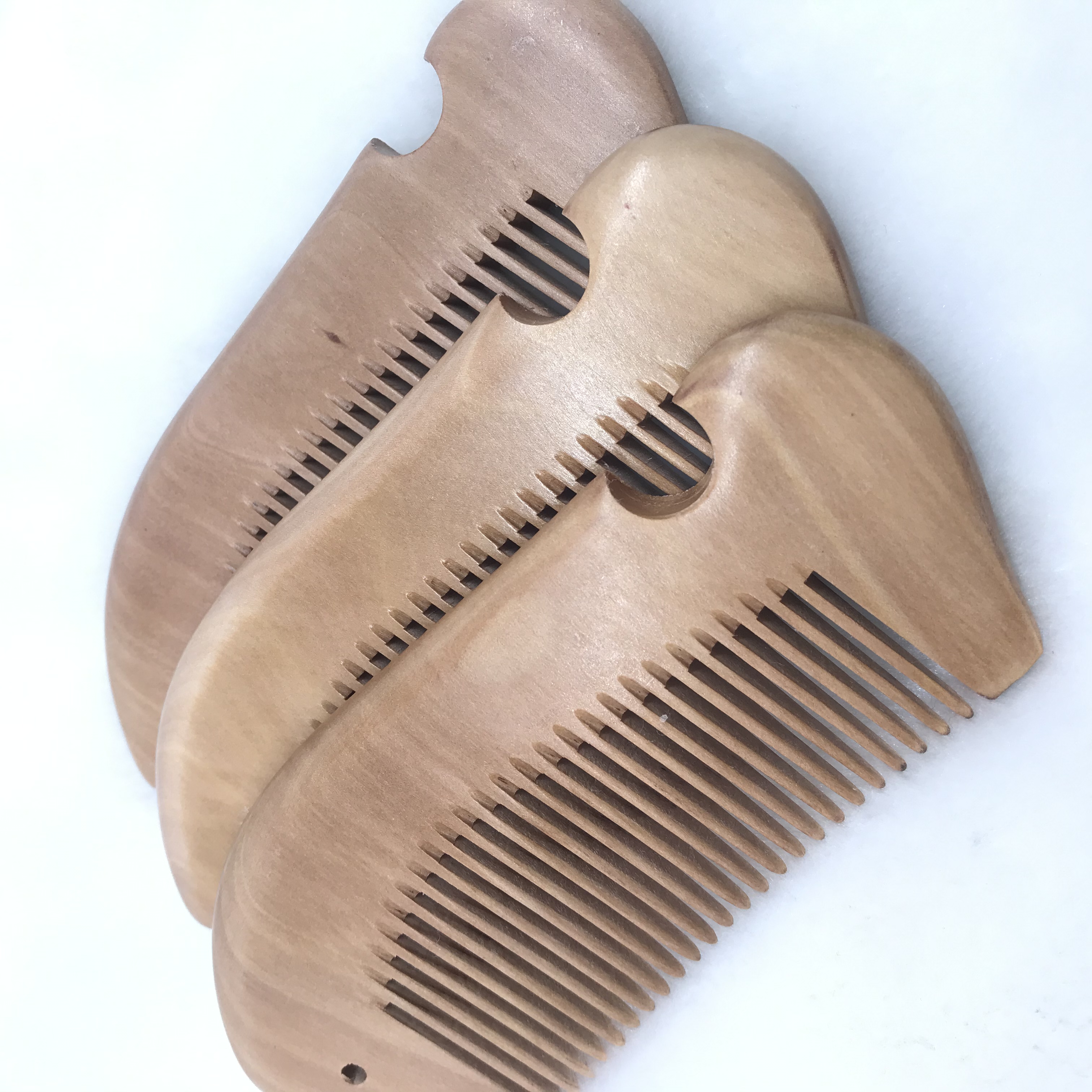 Factory direct sales of genuine natural wood nanmu fish-shaped combs, small hair combs, anti-static hair straightening combs detail image 8