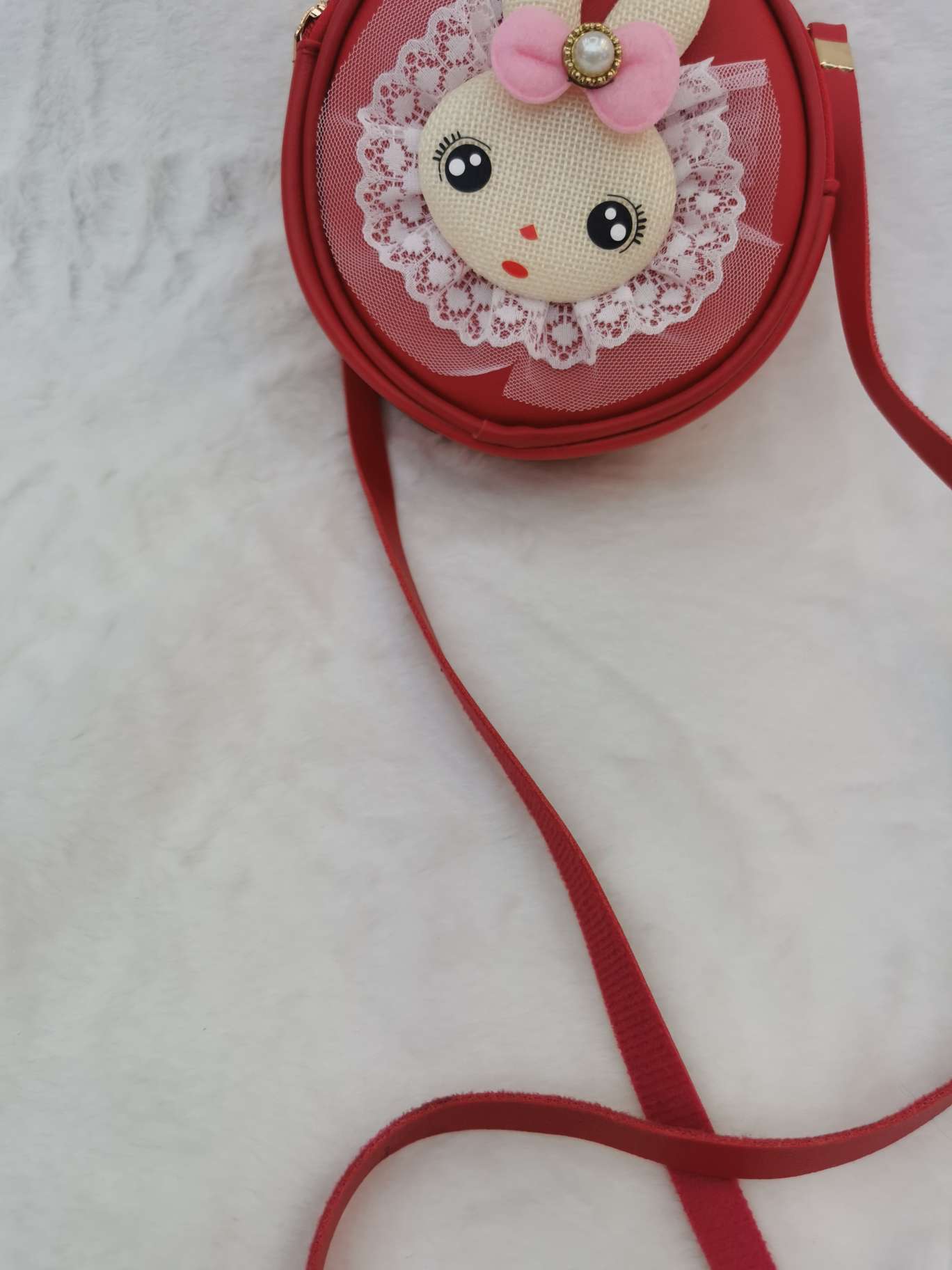 兔头小孩手提挎包产品图