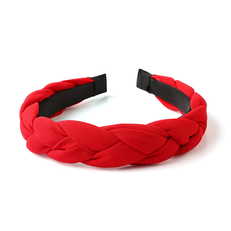 Close-up of textured braid detail in monochrome headband