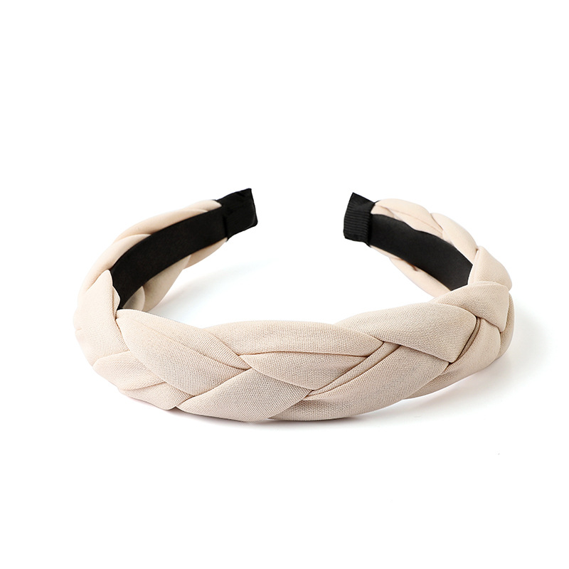 Headband styled with loose hair and minimal makeup