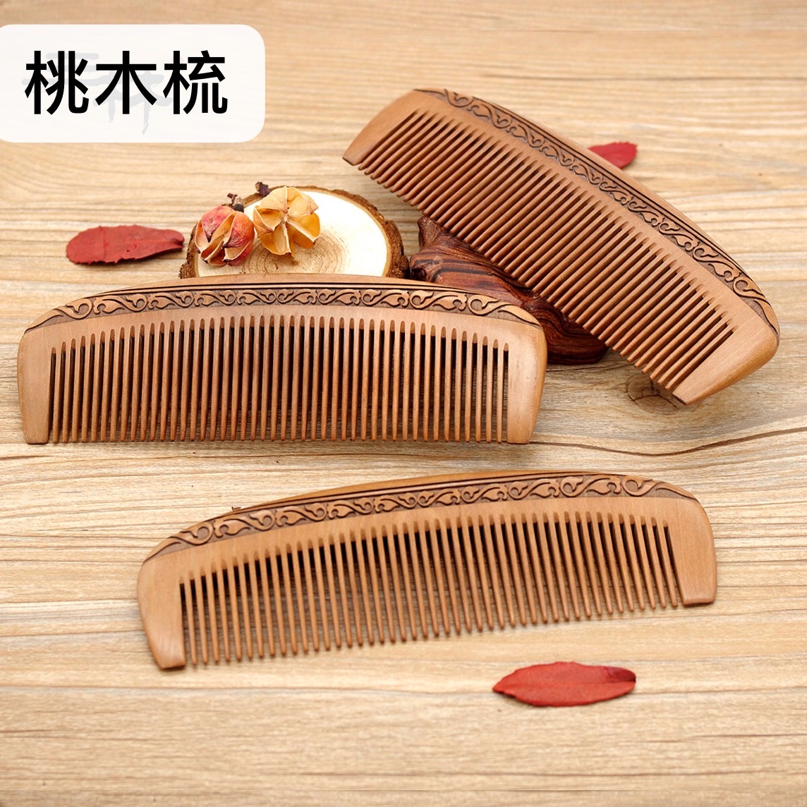 Factory direct sales: Natural log material old peach wood comb, double-sided carving process comb, crescent-shaped comb Item Picture