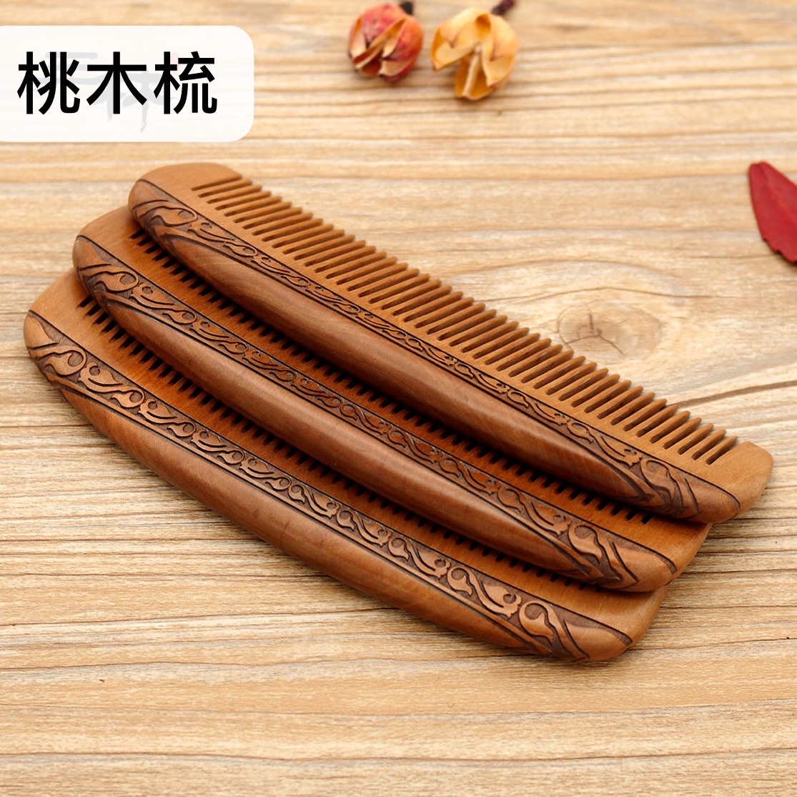 Factory direct sales: Natural log material old peach wood comb, double-sided carving process comb, crescent-shaped comb Application Scenario