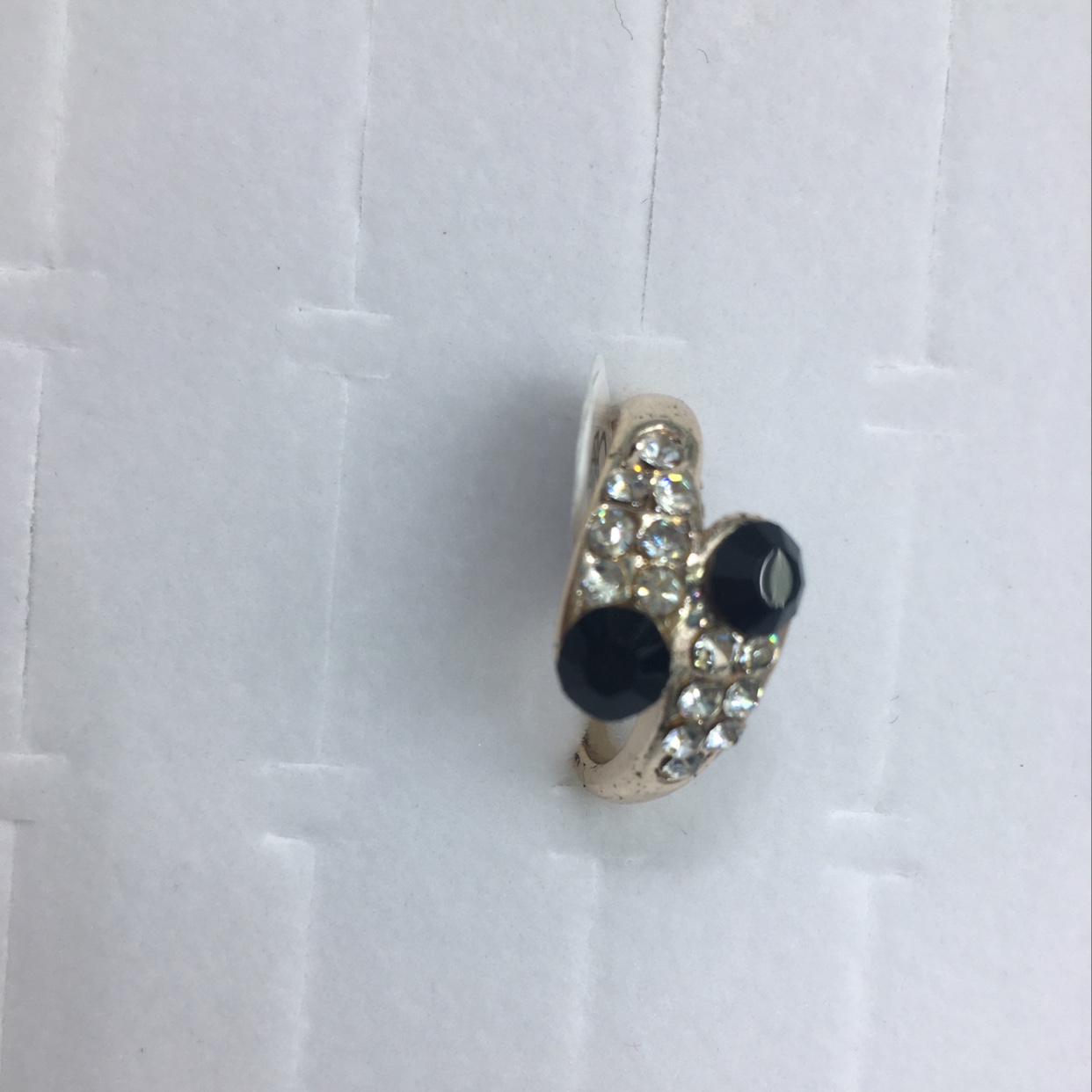 Alloy rhinestone plated gold ring.