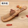 Factory direct sales of genuine, double-sided carved peach wood combs with large-sized handles Specification image