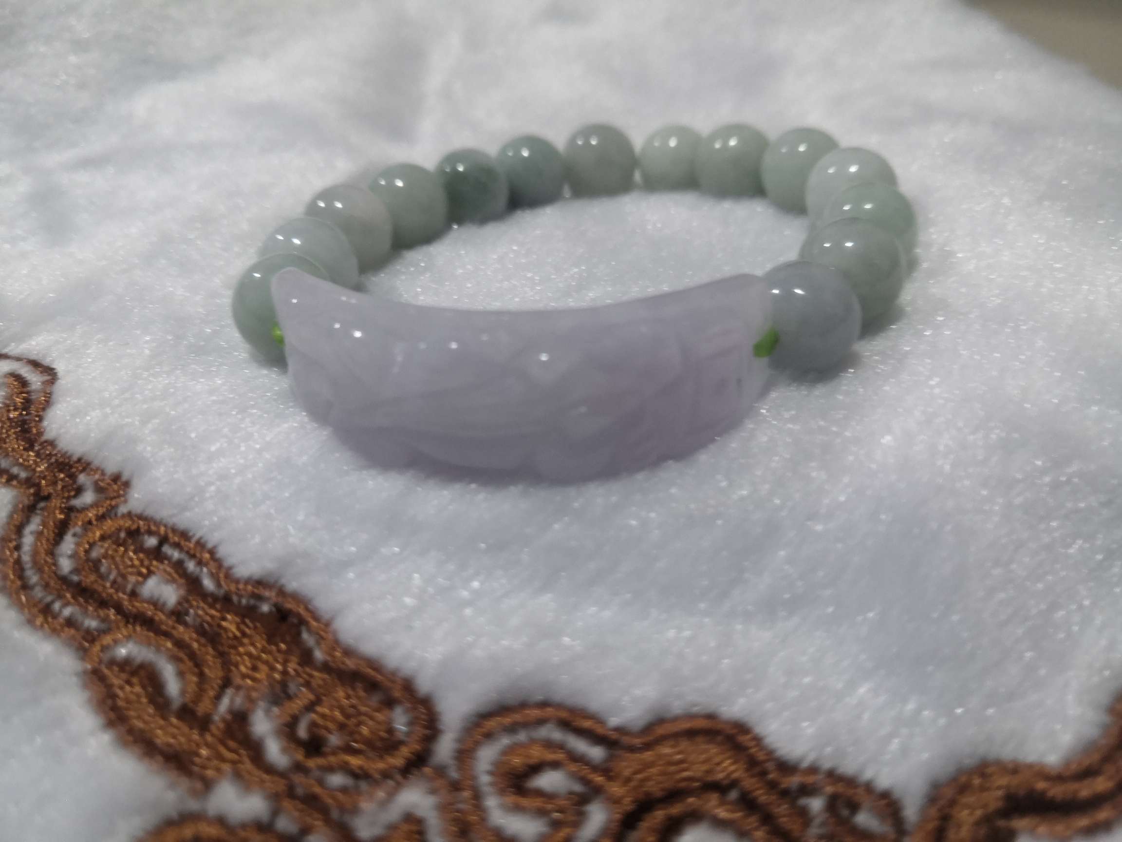 天然紫罗兰翡翠手串手镯玉兰花雕刻细节图