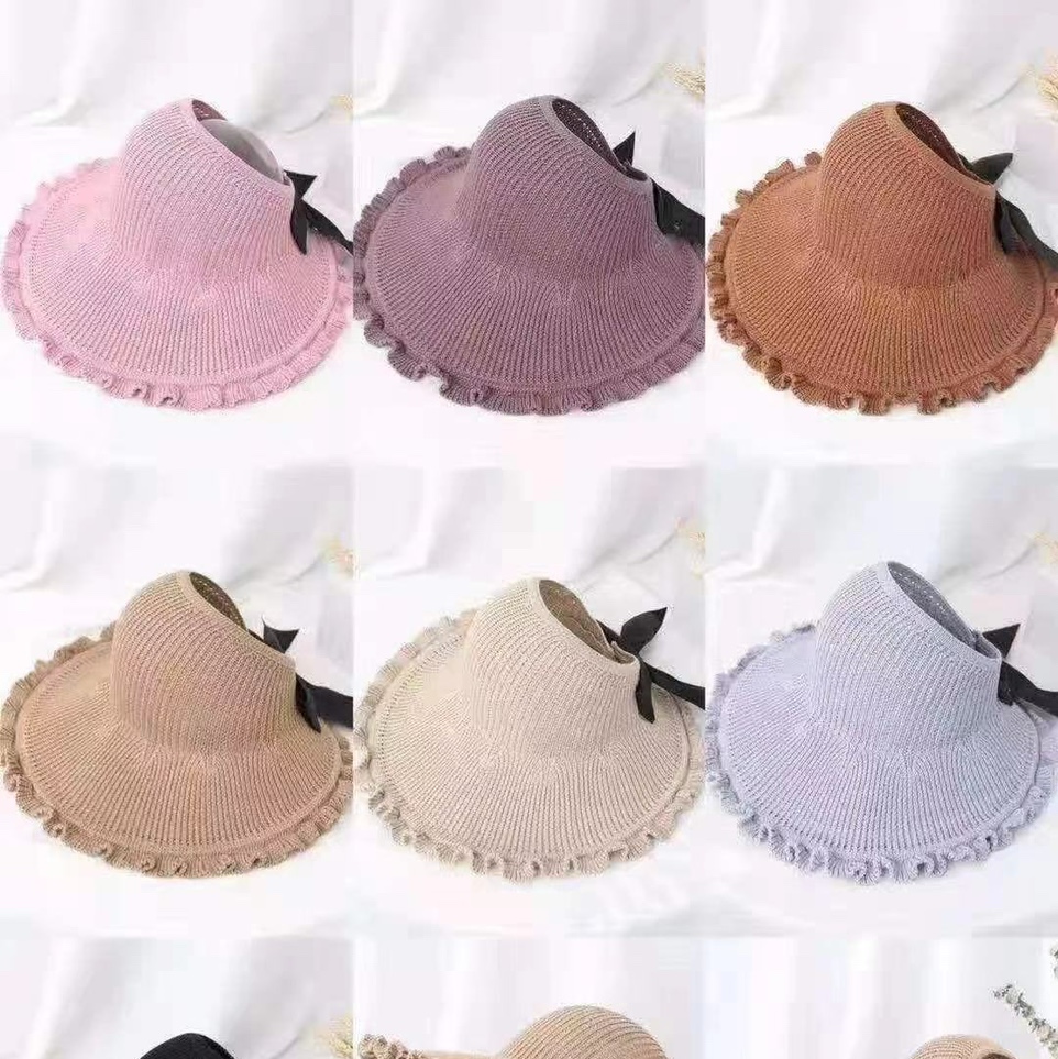 A ruffled lady's open-top hat