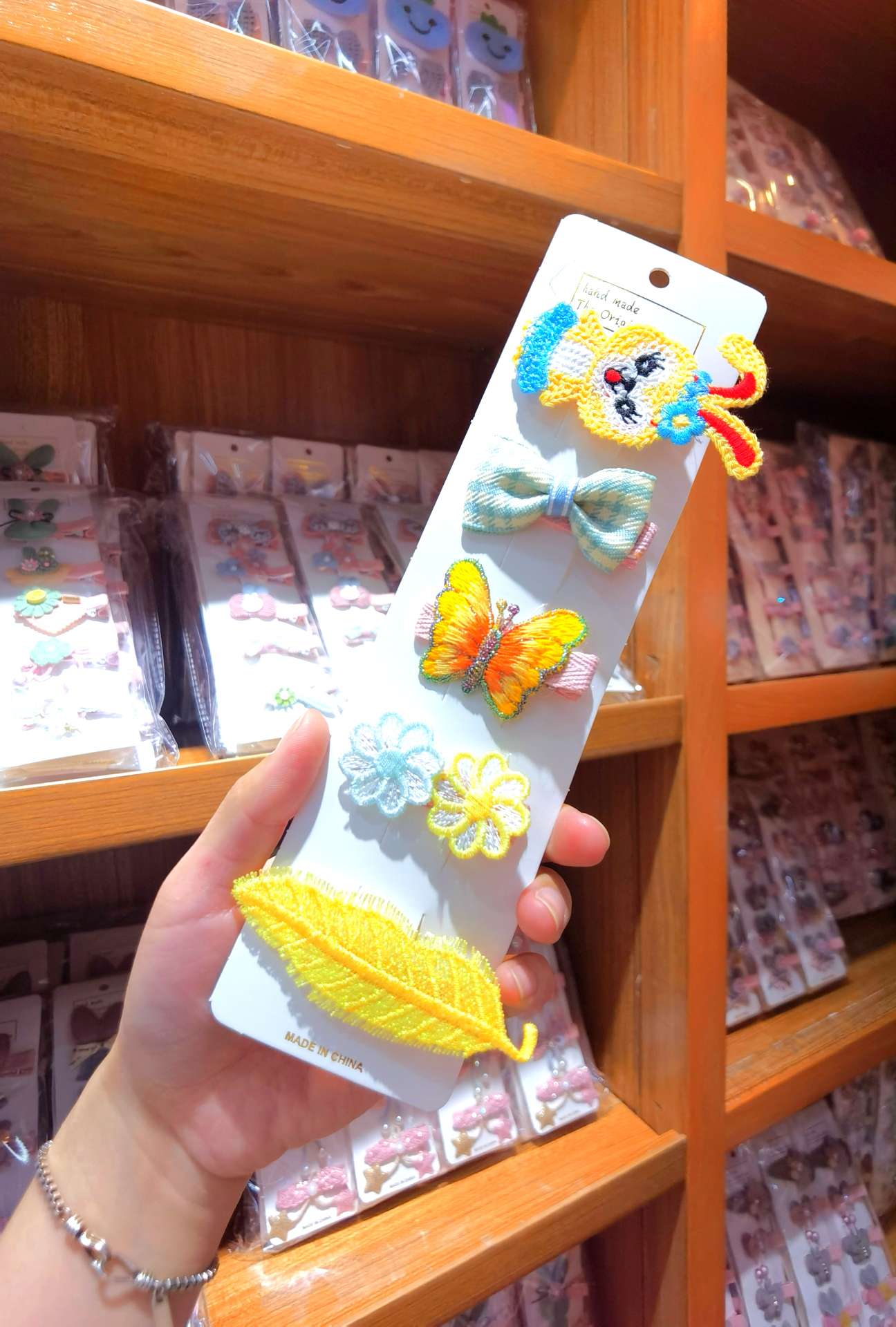 A new 5-piece set of children's hair clips from Japan and South Korea, featuring cute knitted and embroidered side clips detail image 1