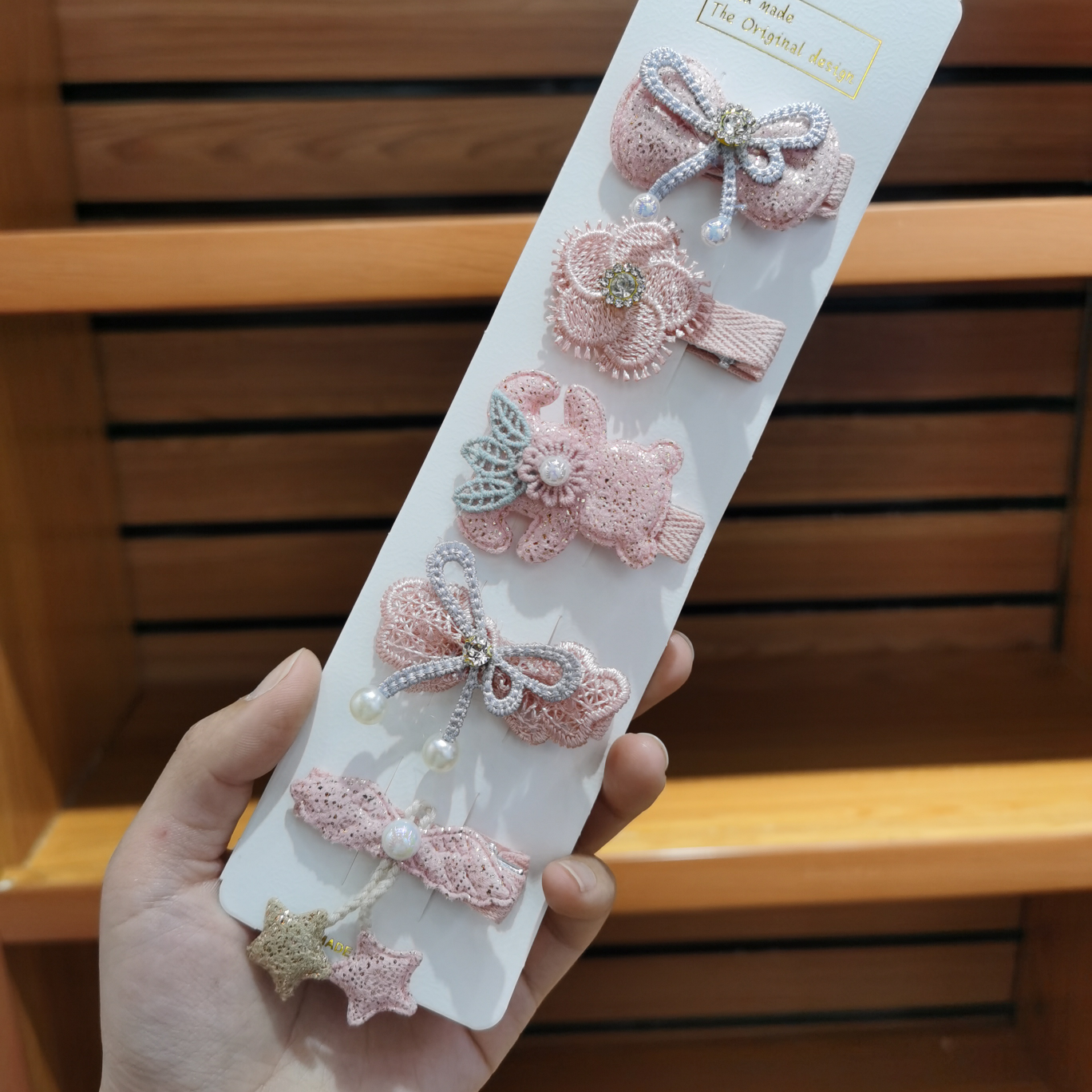 A 5-piece set of Korean-style children's hair clips with a hairpin edge that won't damage the hair