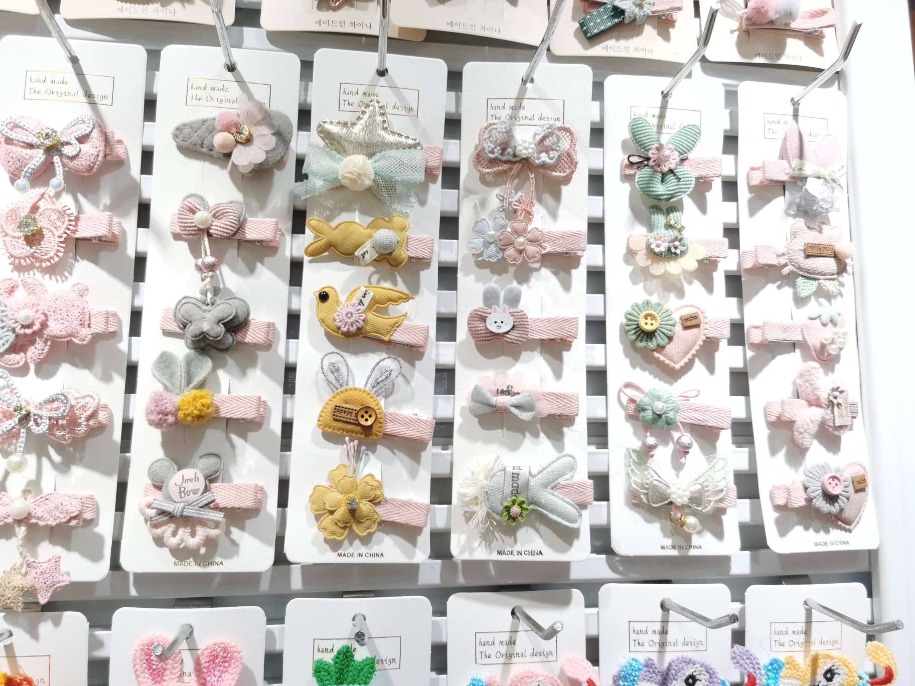 A 5-piece set of Korean-style children's hair clips with a hairpin edge that won't damage the hair detail image 7